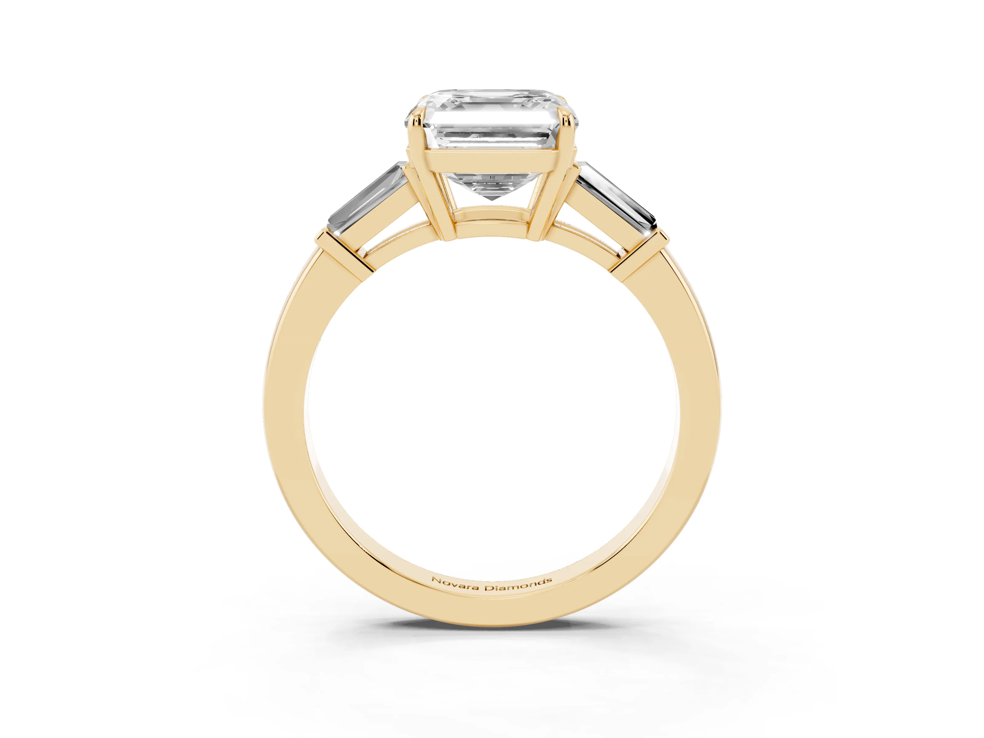 Asscher Cut Diamond Three-Stone Ring Set in Yellow gold with Tapered Baguette Side Stones and Prong Setting