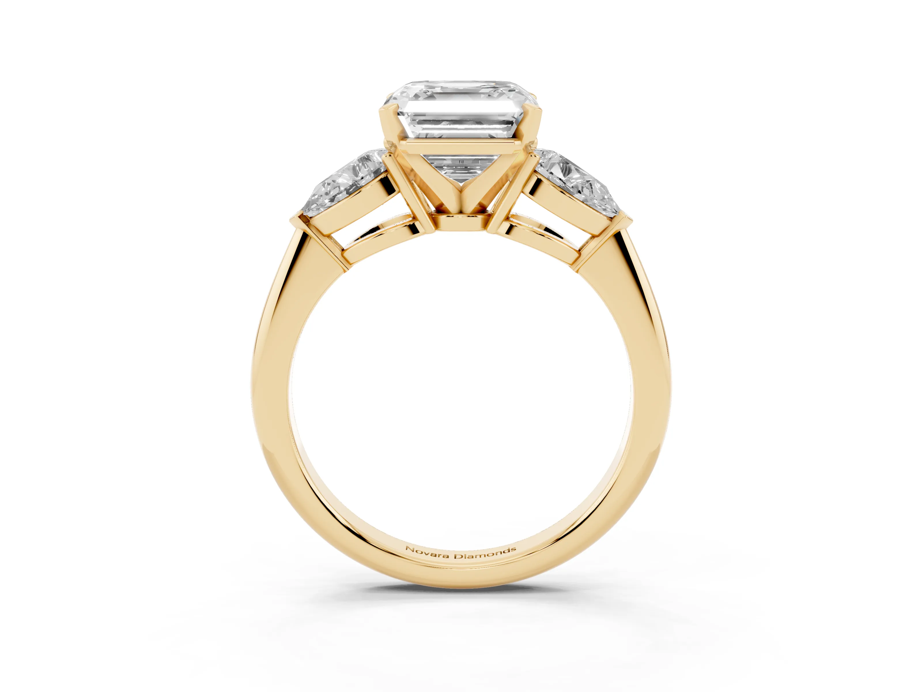 Three-Stone Asscher Cut Diamond Ring Set in Yellow gold with Pear Side Stones and Prong Setting