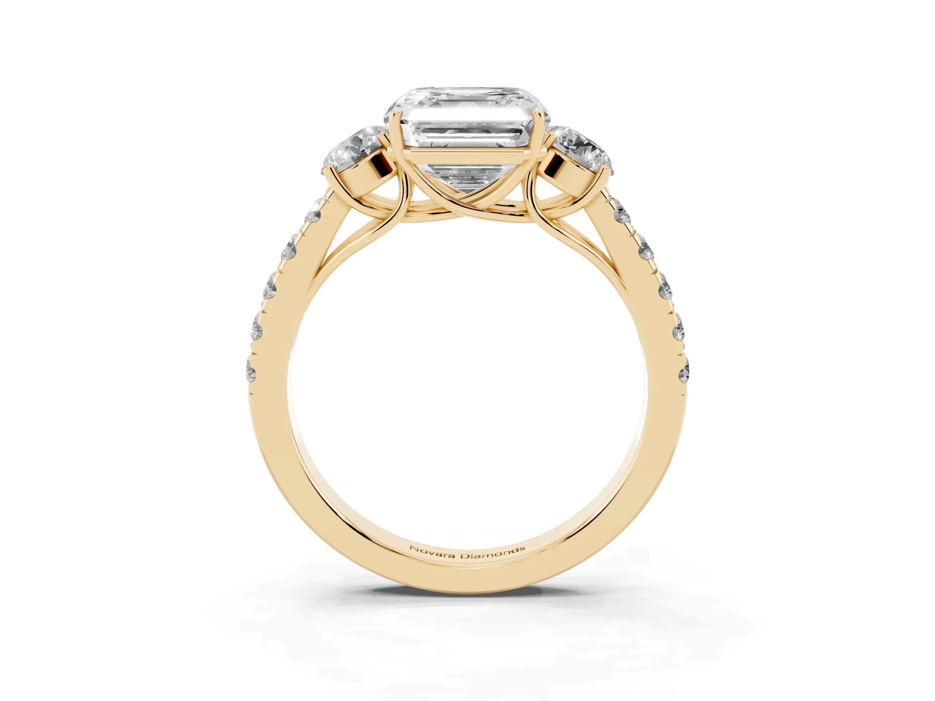 Asscher Cut Diamond Three-Stone Ring Set in Yellow gold with Round Side Stones and Delicate Pavé Band