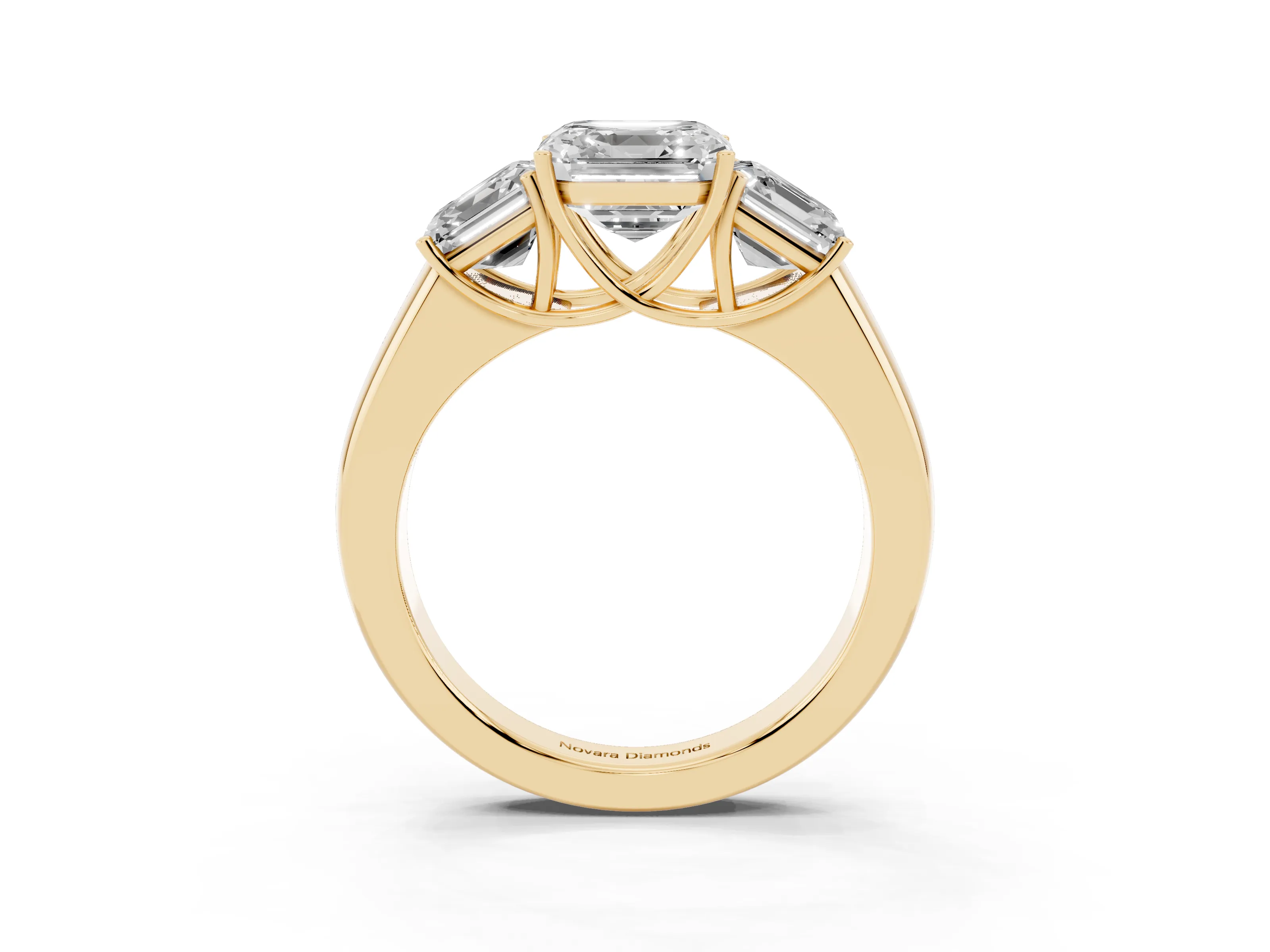 Three-Stone Asscher Cut Diamond Ring Set in Yellow gold with Matching Prong Settings and Plain Band
