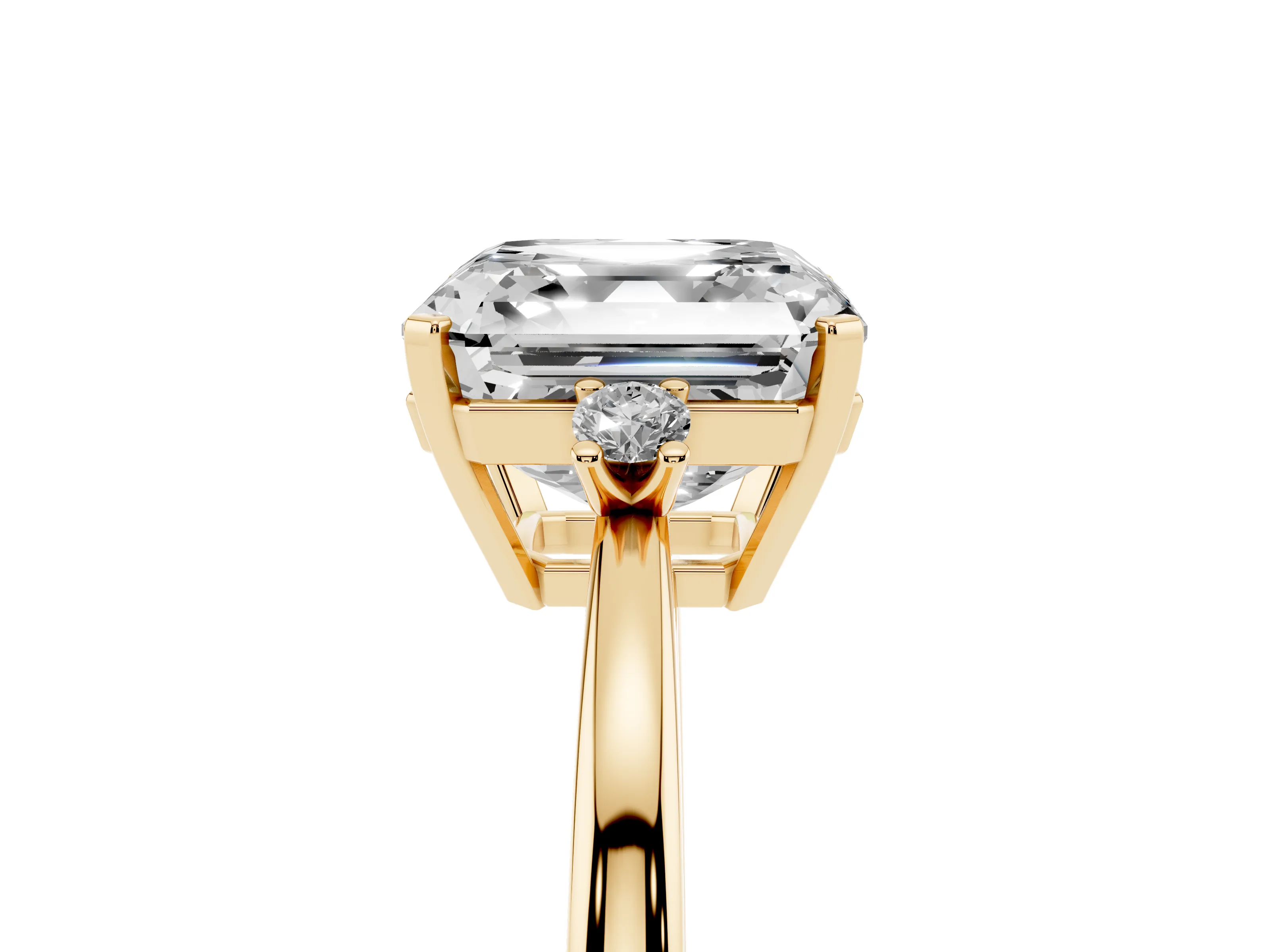 Three-Stone Asscher Cut Diamond Solitaire Ring Set in Yellow gold with Round Accent Stones and Prong Setting