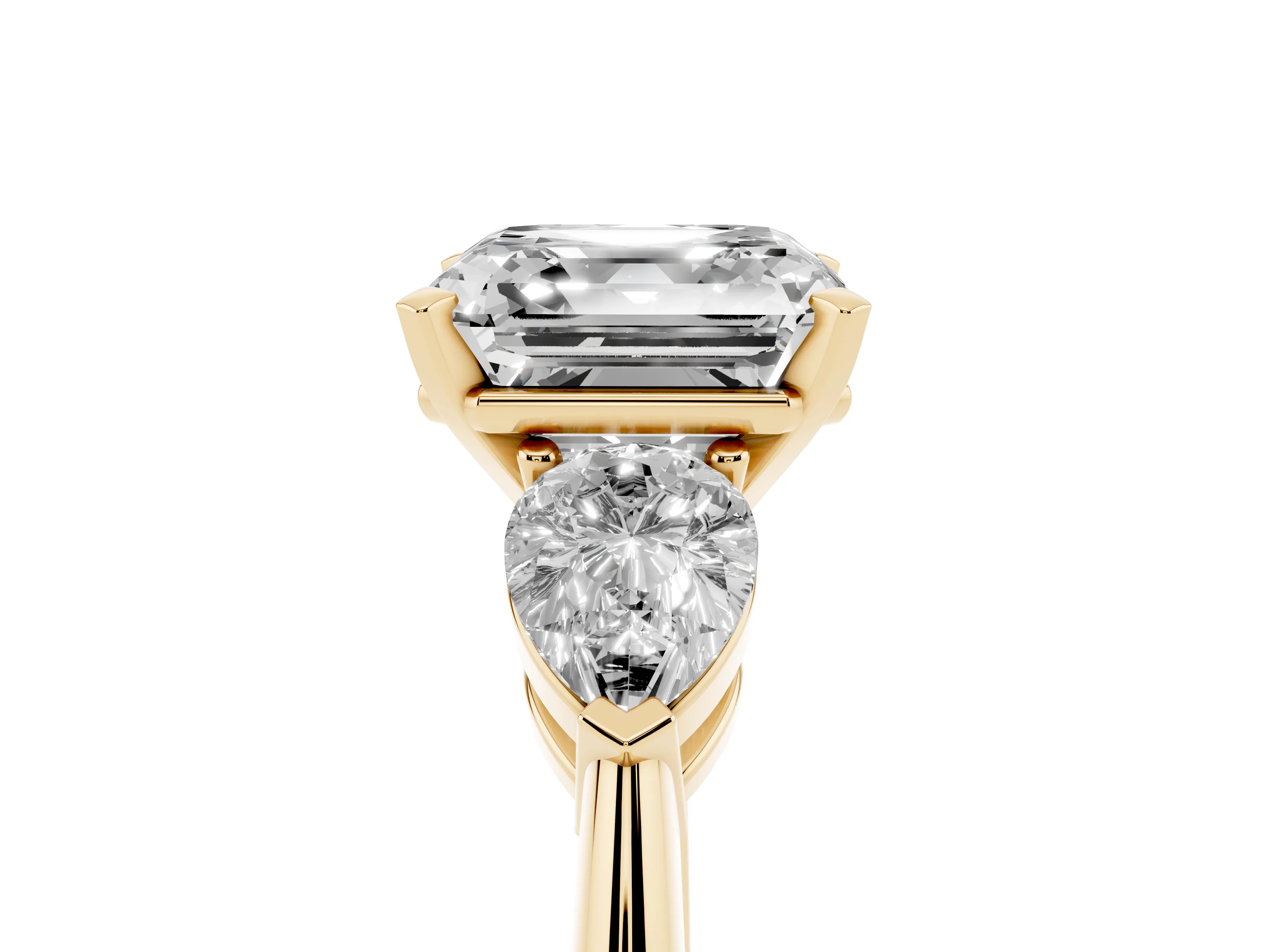 Three-Stone Asscher Cut Diamond Ring Set in Yellow gold with Pear Side Stones and Prong Setting
