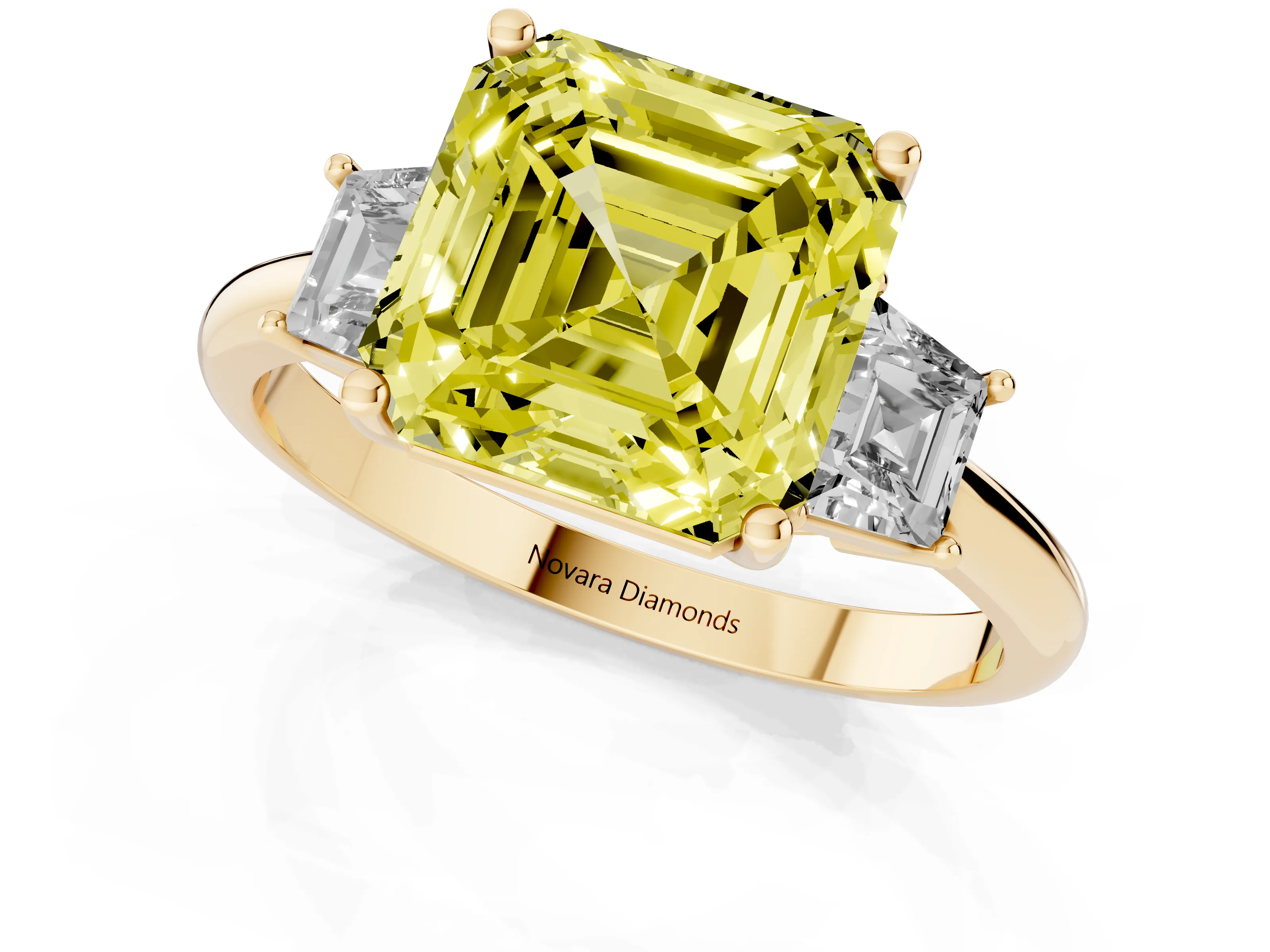 Fancy Yellow Asscher Cut Diamond Three-Stone Ring Set in Yellow gold with Trapezoid Side Stones and Prong Setting
