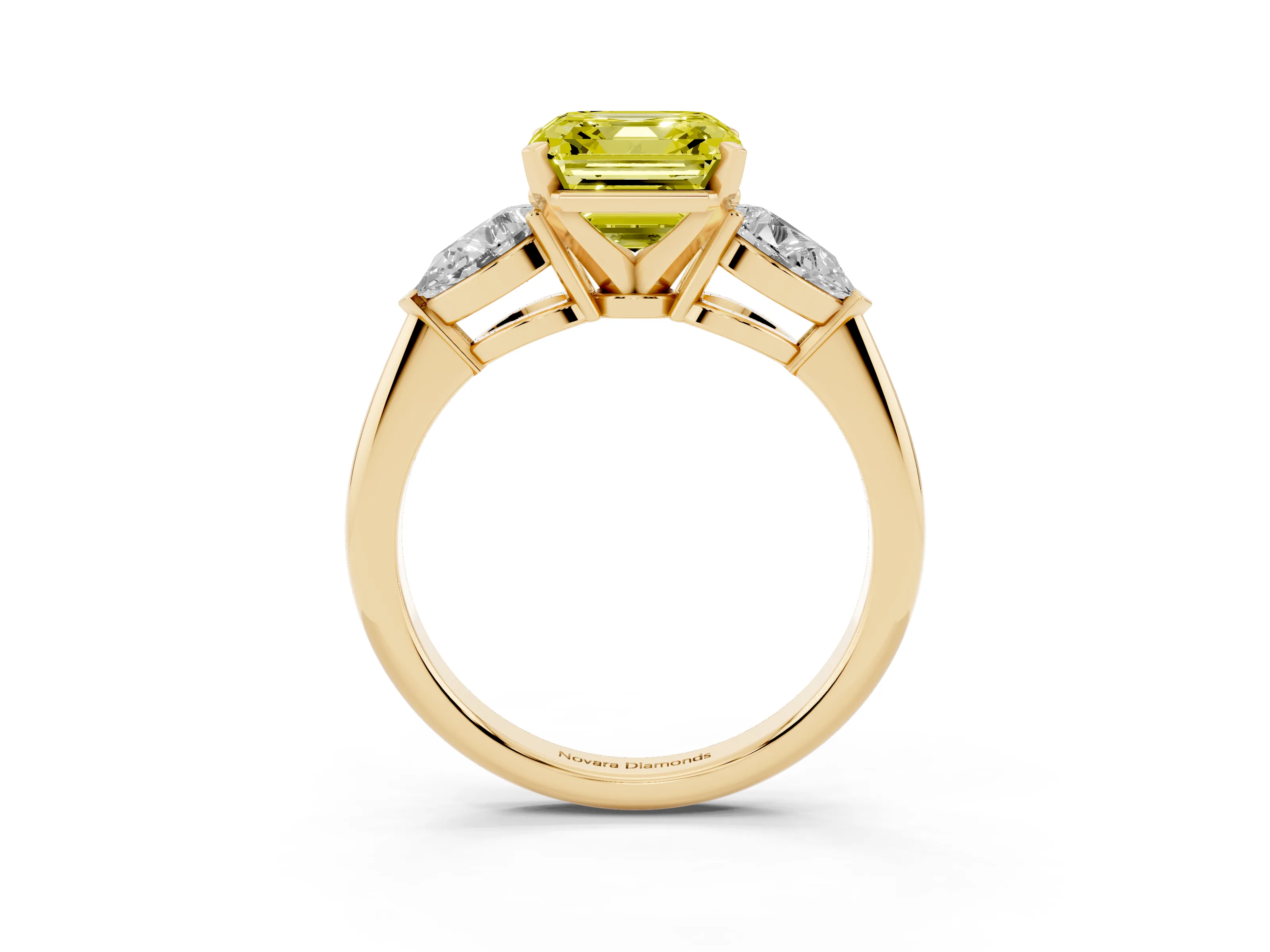 Fancy Yellow Three-Stone Asscher Cut Diamond Ring Set in Yellow gold with Pear Side Stones and Prong Setting