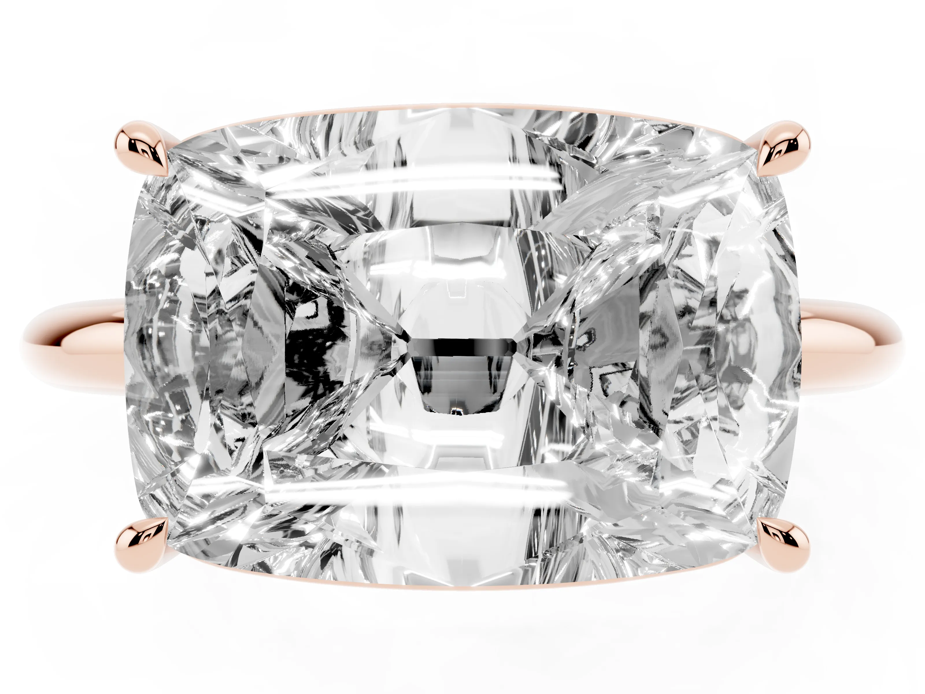Old Mine Elongated Cushion Diamond East-West Solitaire Ring Set in Rose gold with Bezel and Four Claw Setting