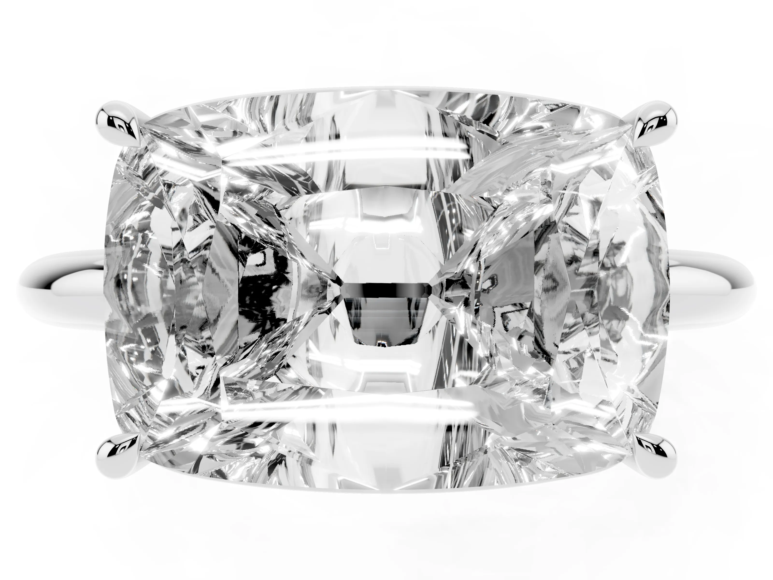 Old Mine Elongated Cushion Diamond East-West Solitaire Ring Set in White gold with Bezel and Four Claw Setting