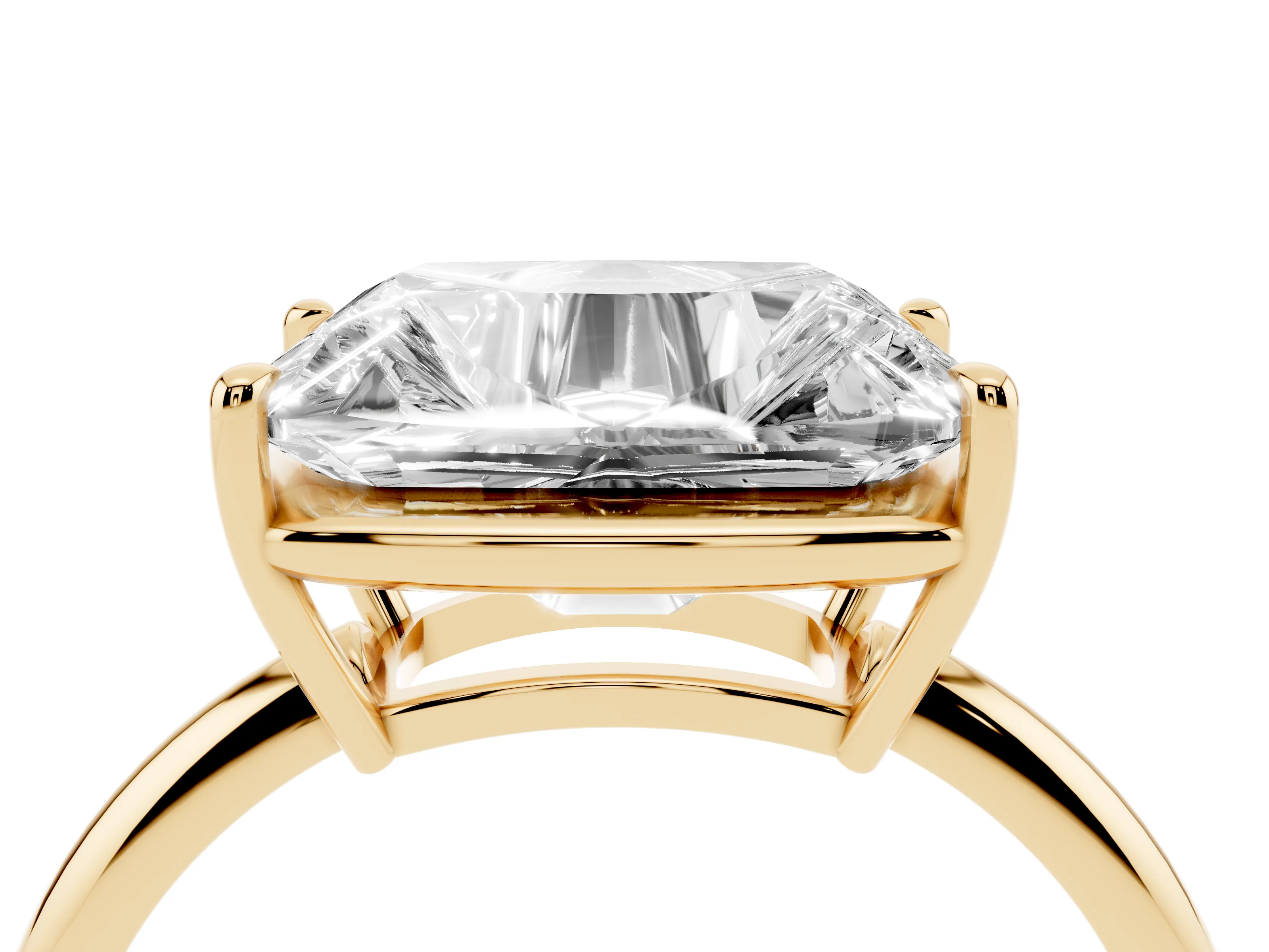 Old Mine Elongated Cushion Diamond East-West Solitaire Ring Set in Yellow gold with Bezel and Four Claw Setting