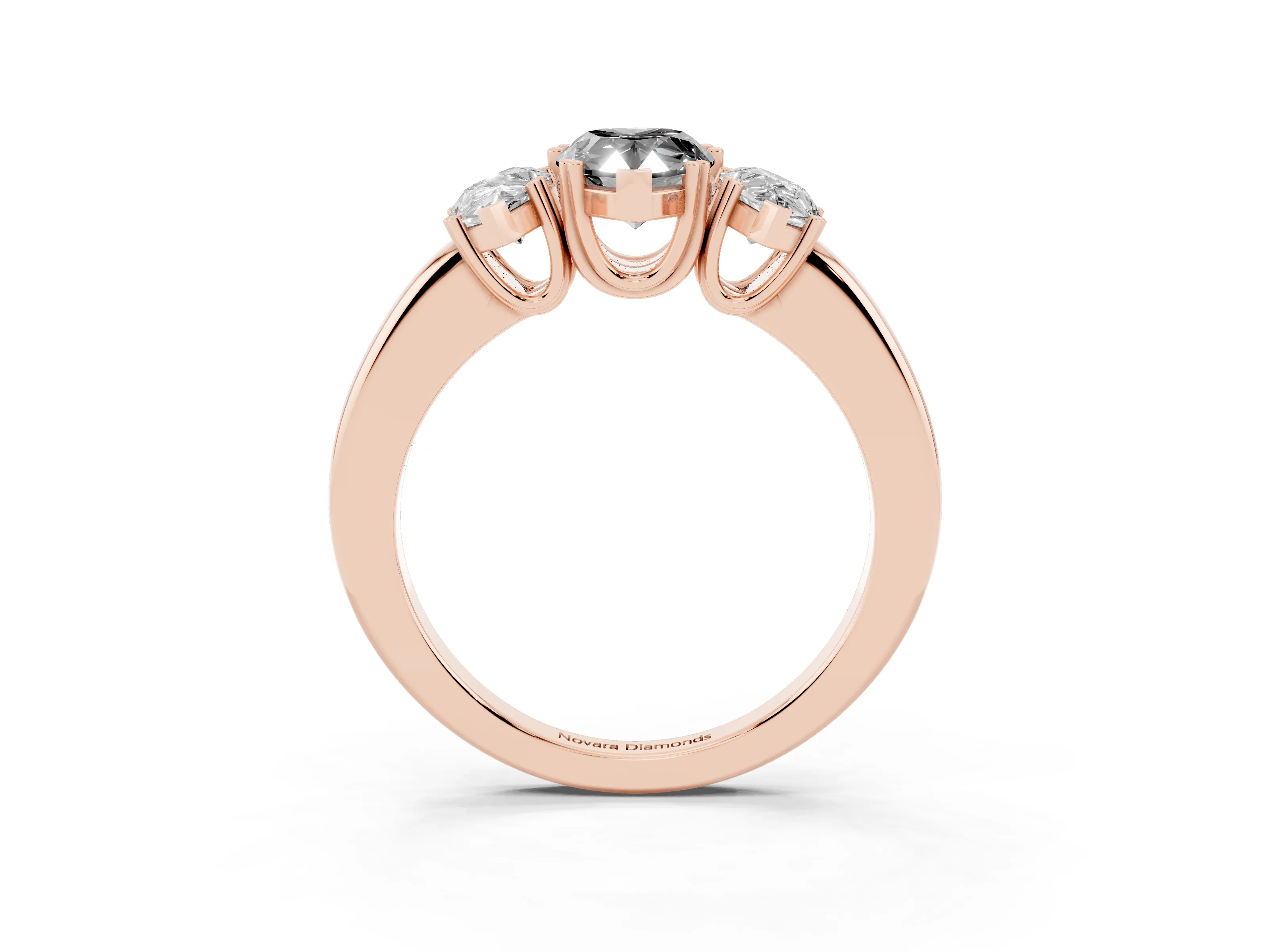 Fancy Black Pear Cut Diamond Three-Stone Ring Set in Rose gold with Polished Channel-Set Band