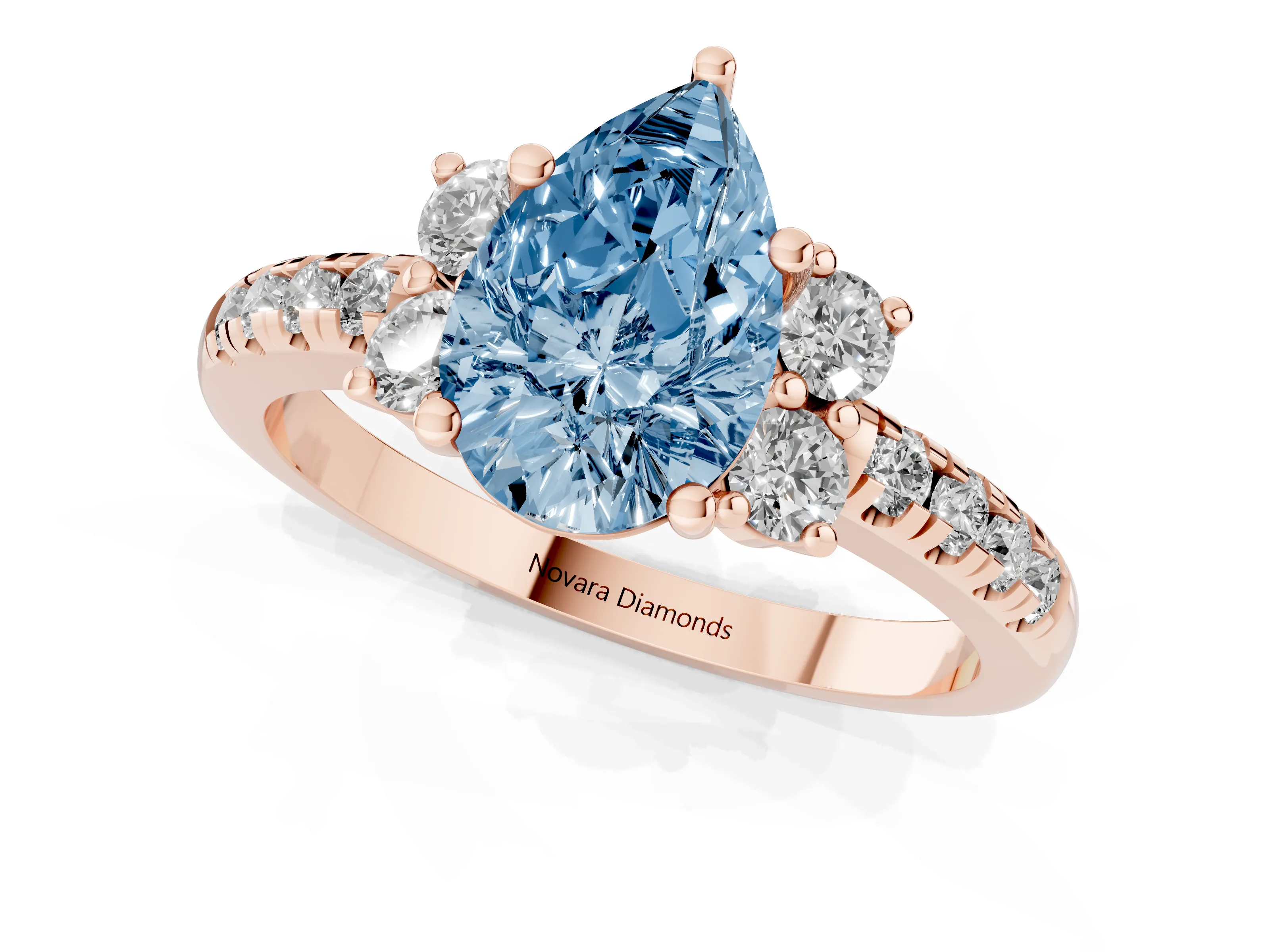 Fancy Blue Pear Cut Diamond Three-Stone Pavé Ring Set in Rose gold with Prong Setting