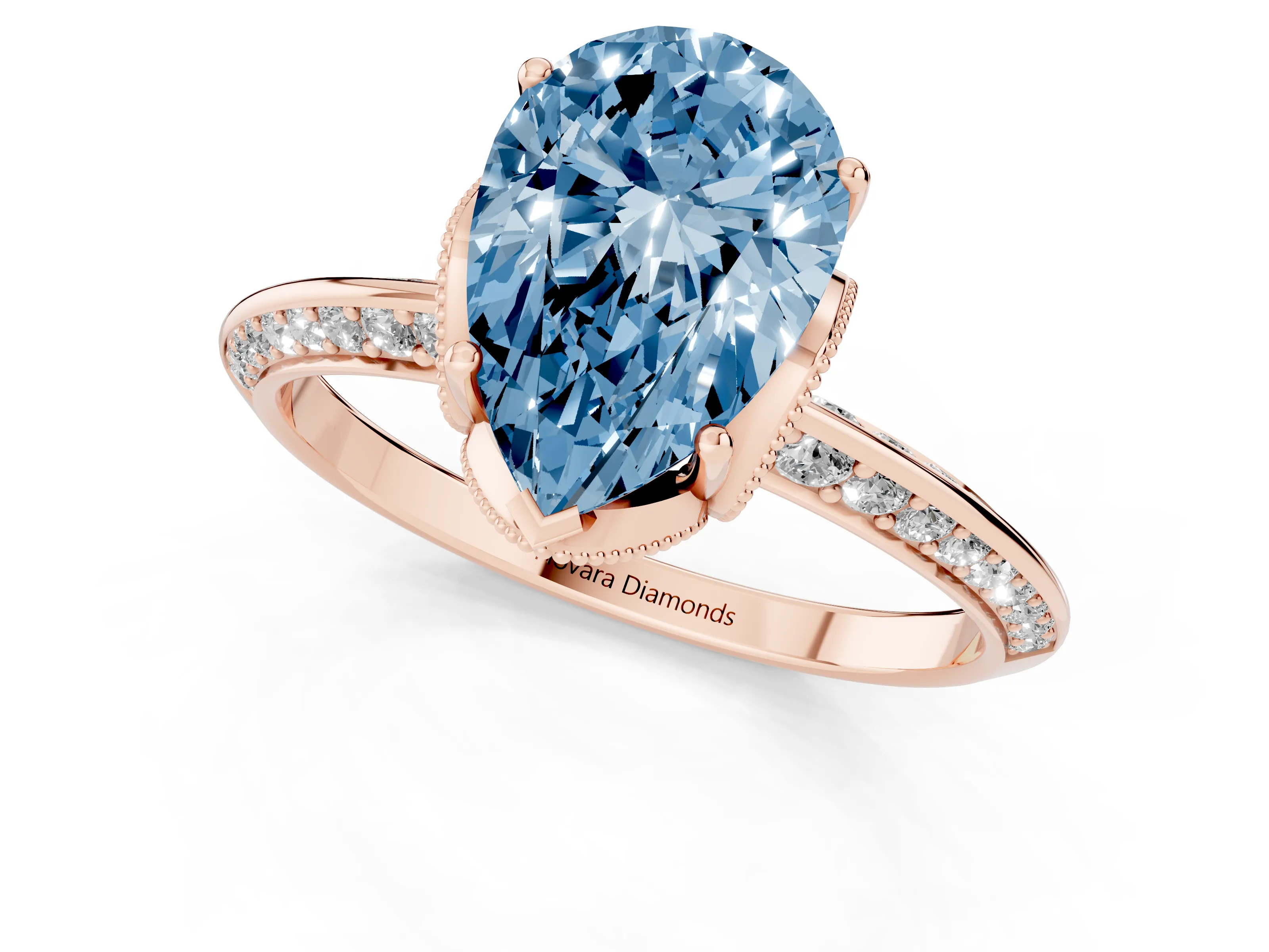 Fancy Blue Pear Cut Diamond Solitaire Engagement Ring Set in Rose gold with Pavé Split Shank and Prong Setting