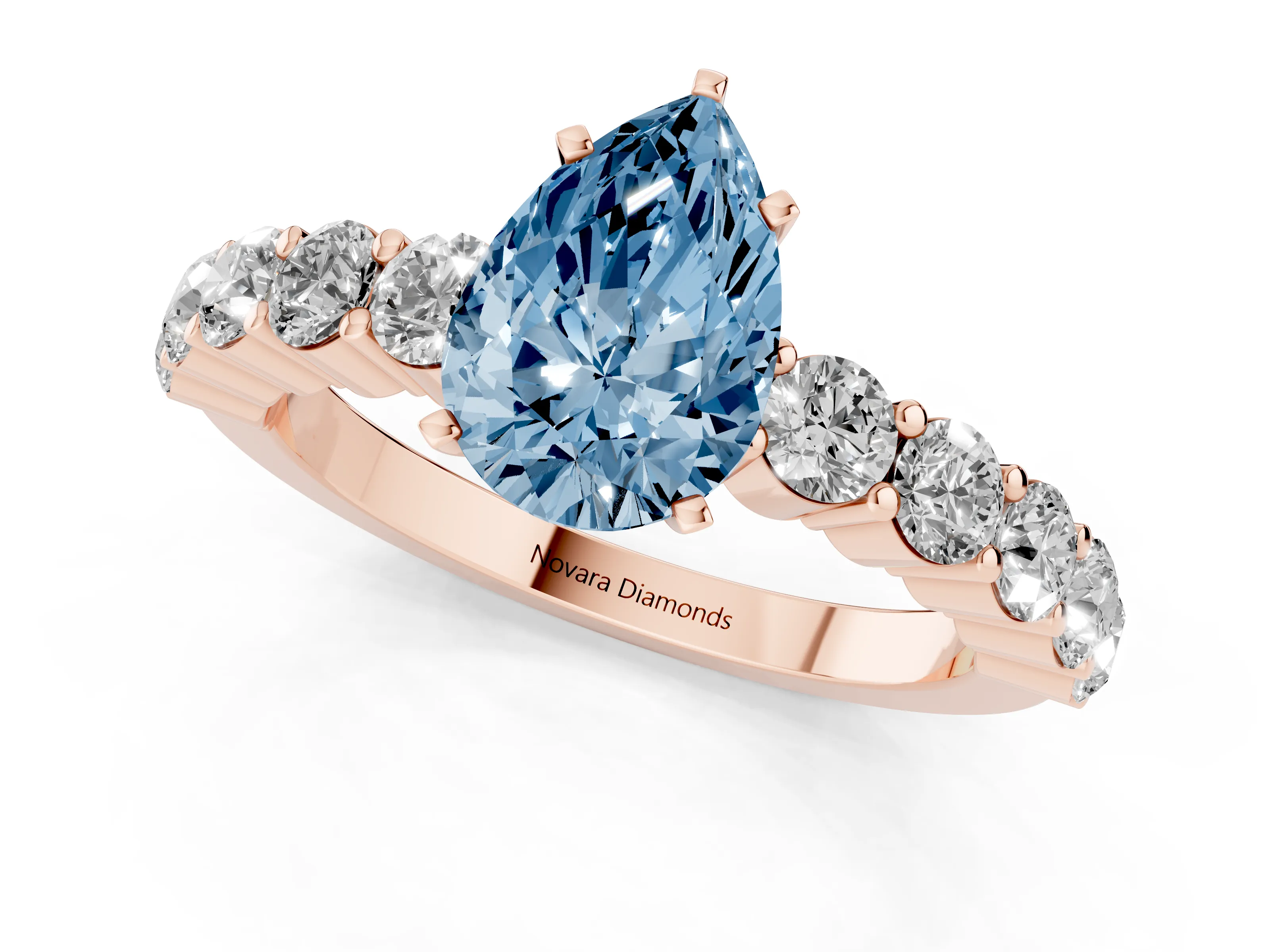 Fancy Blue Pear Cut Diamond Solitaire Ring Set in Rose gold with Shared Prong Round Side Stones