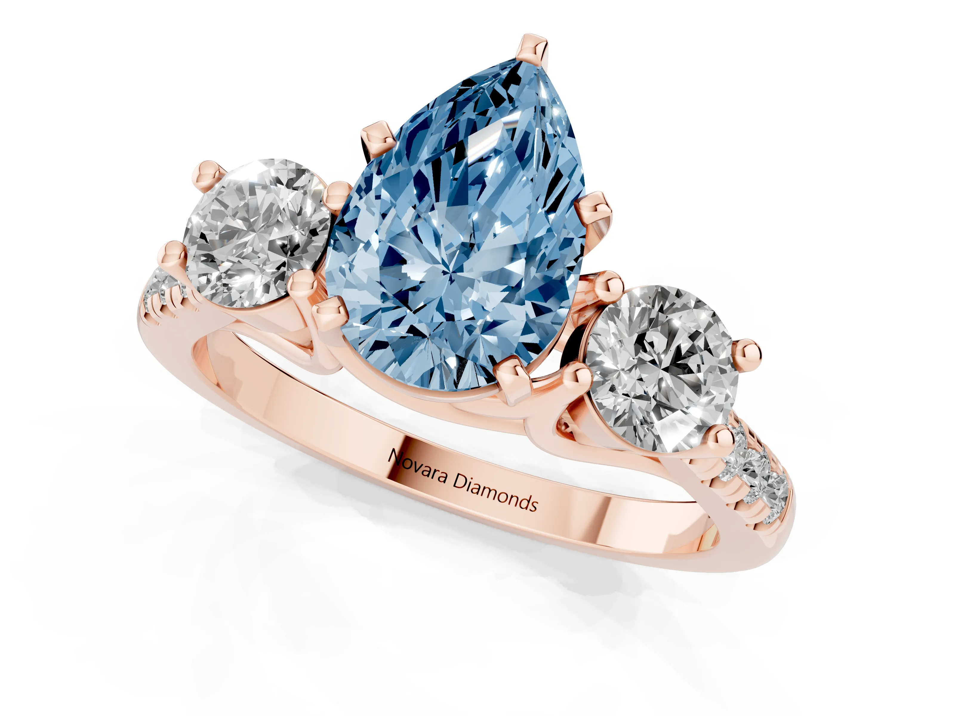 Fancy Blue Three-Stone Pear Cut Diamond Pavé Band Ring Set in Rose gold with Prong-Set Trio
