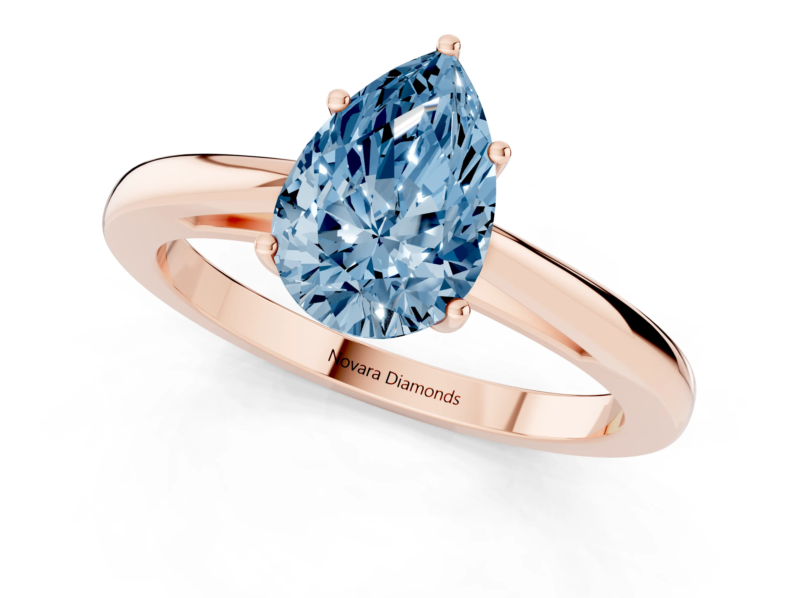 Fancy Blue Pear Cut Diamond Solitaire Ring Set in Rose gold with Split Shank and Prong Setting