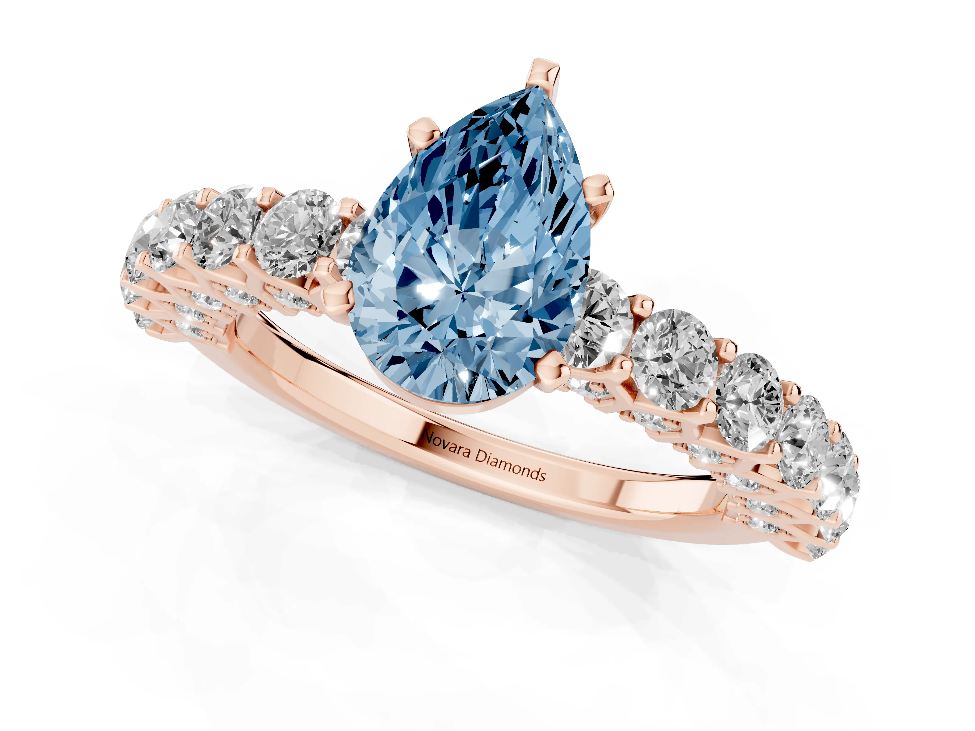Fancy Blue Pear Cut Diamond Solitaire Ring Set in Rose gold with Shared Prong Pavé Band