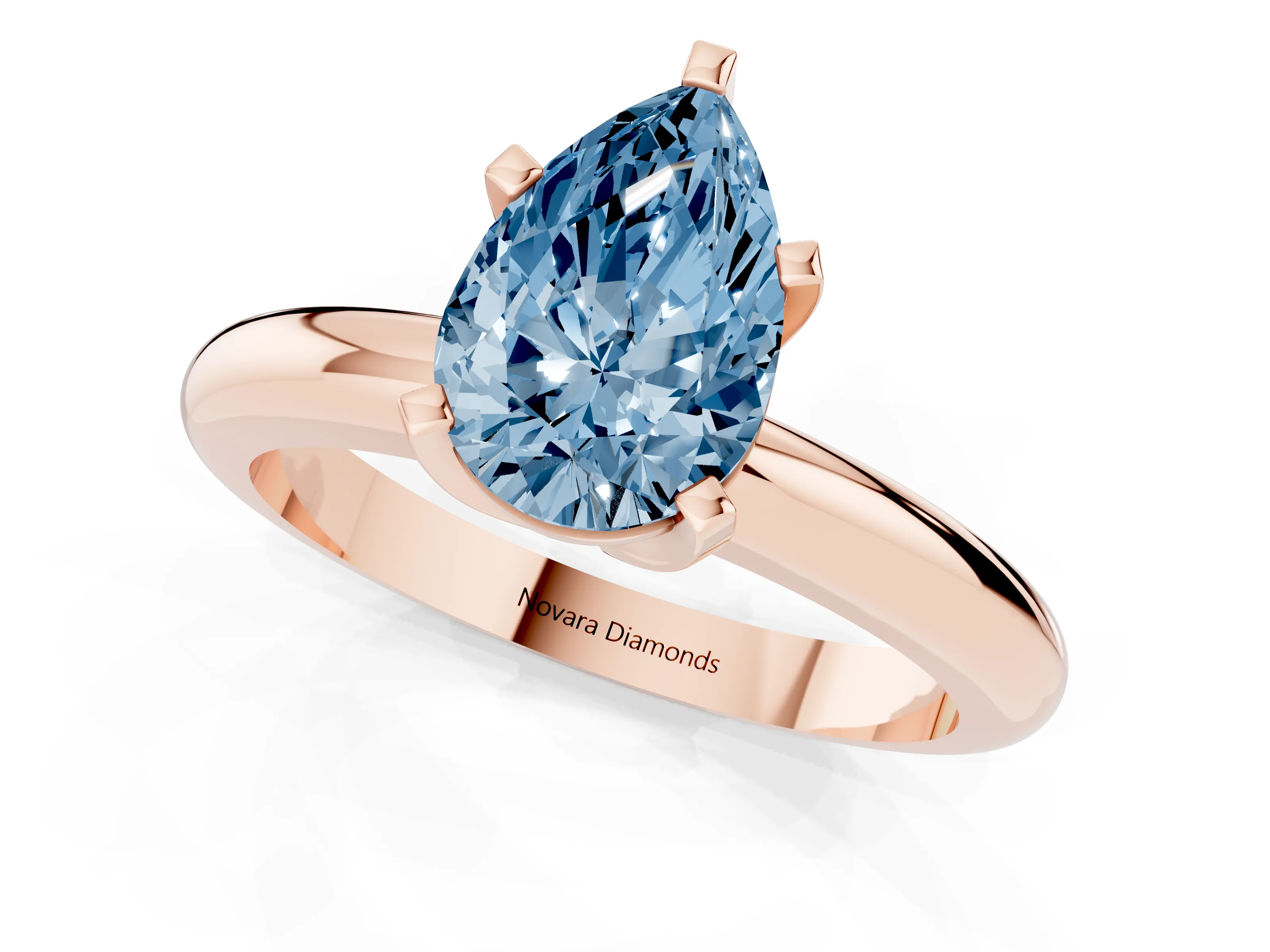 Fancy Blue Pear Cut Diamond Solitaire Engagement Ring Set in Rose gold with Round Band and Prong Setting