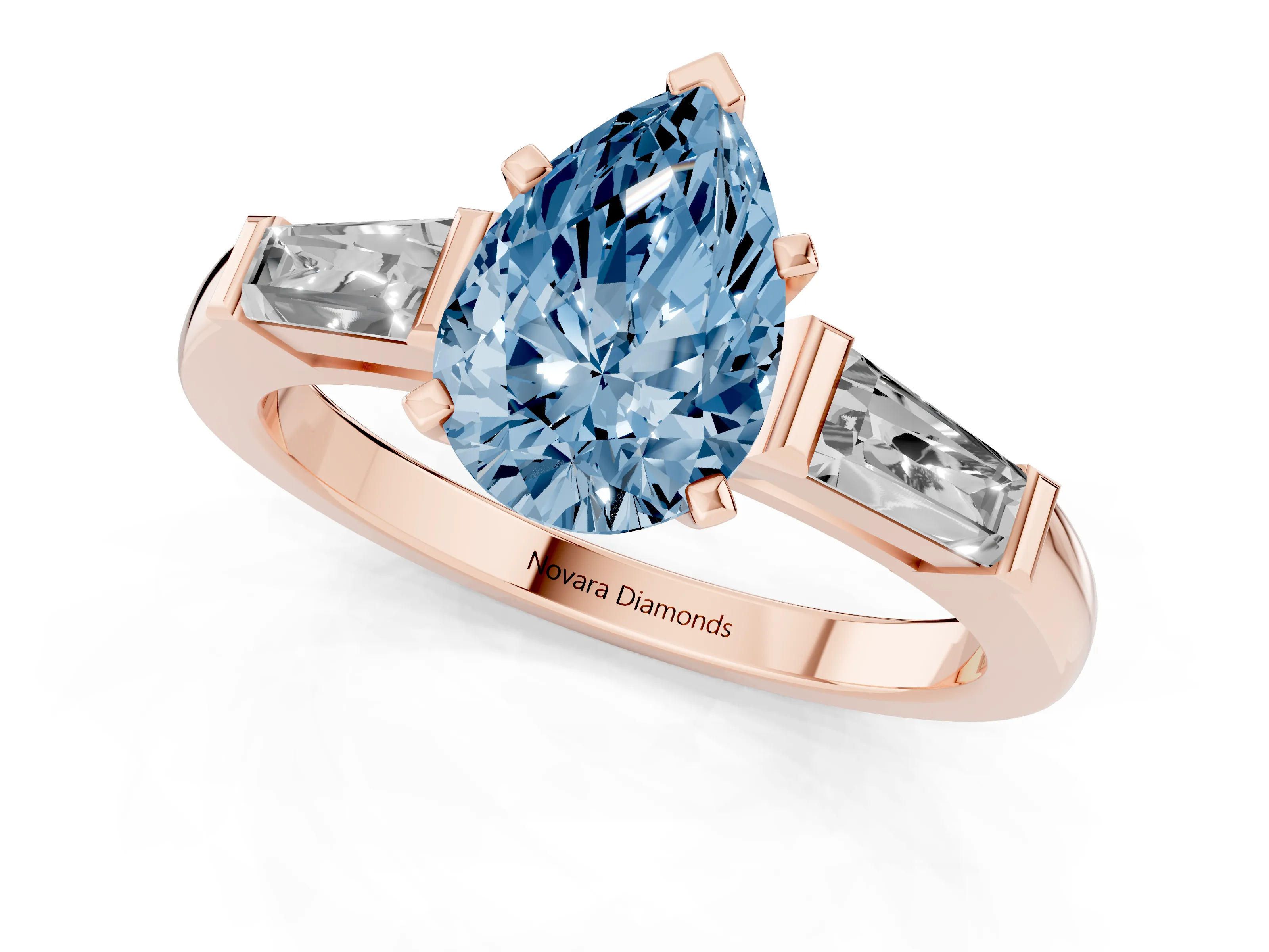 Fancy Blue Pear Cut Diamond Solitaire Ring Set in Rose gold with Tapered Baguette Side Stones and Prong Setting