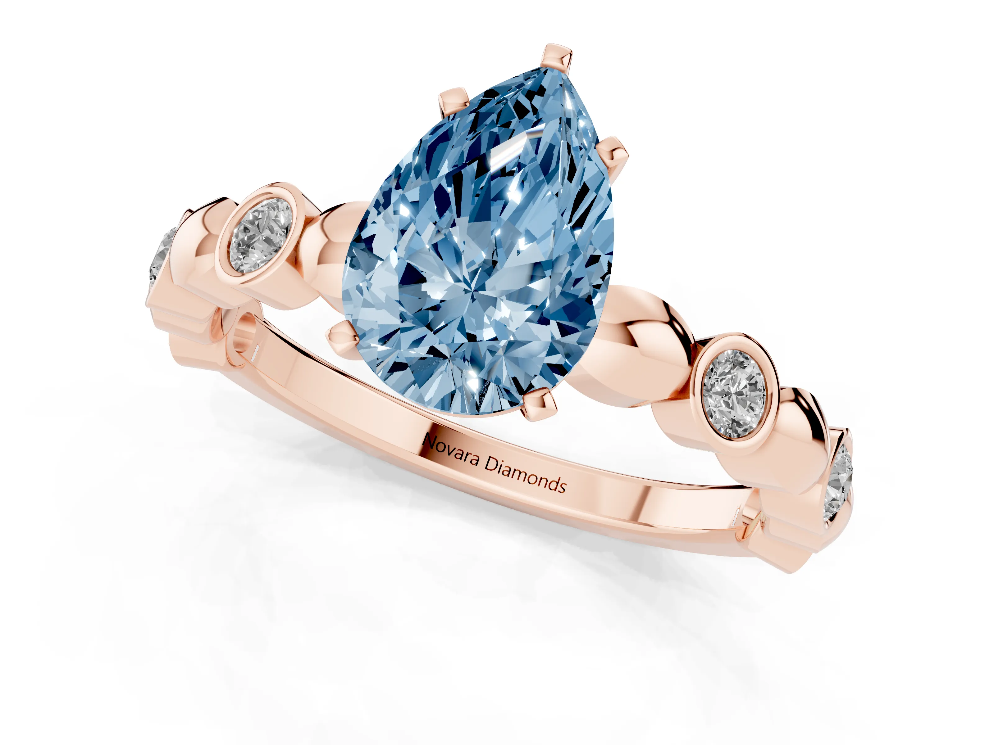 Fancy Blue Pear Cut Diamond Solitaire Ring Set in Rose gold with Bezel-Set Accents on Beaded Band and Prong Setting