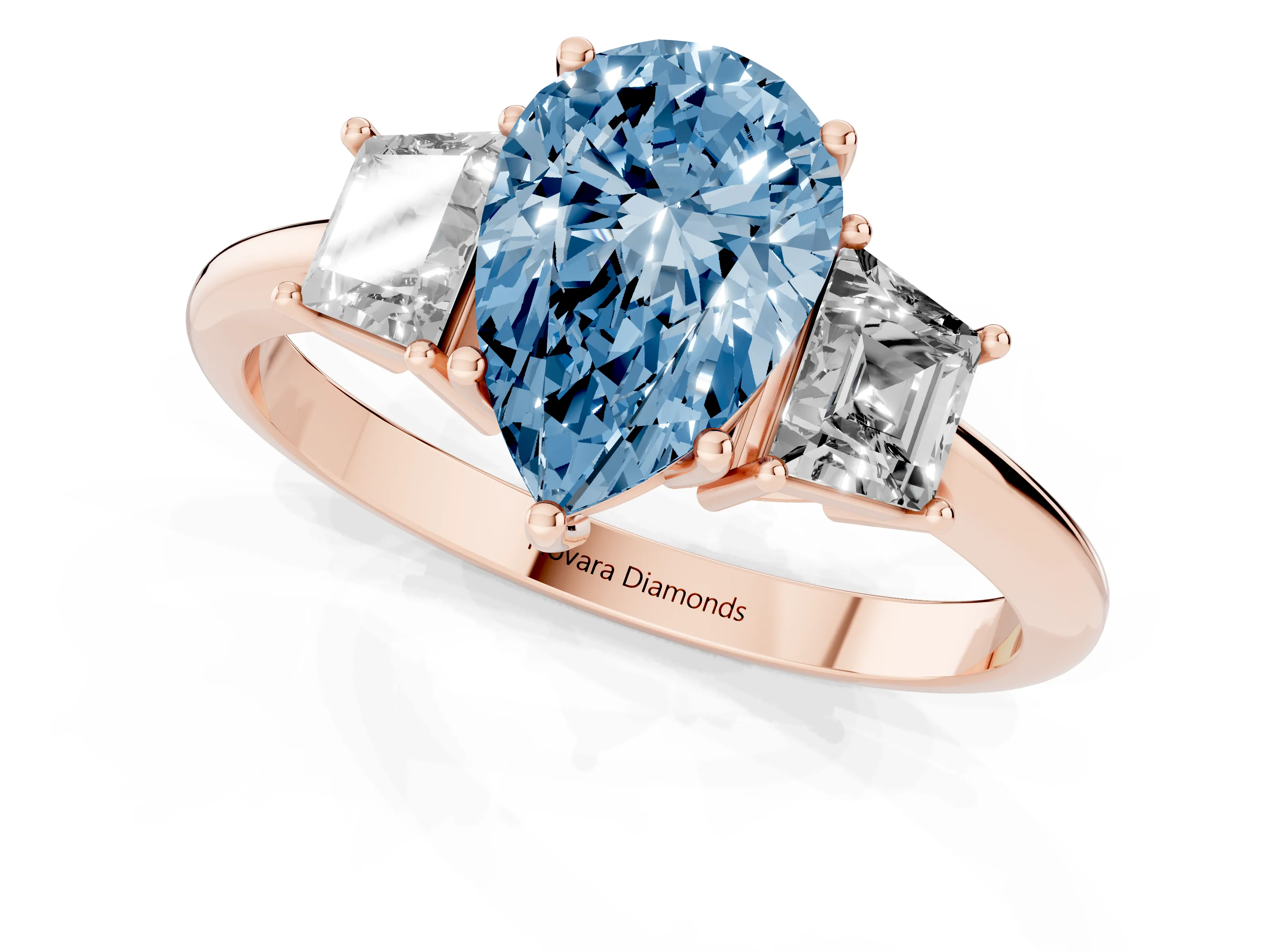 Fancy Blue Pear Cut Diamond Three-Stone Ring Set in Rose gold with Trapezoid Side Stones and Prong Setting