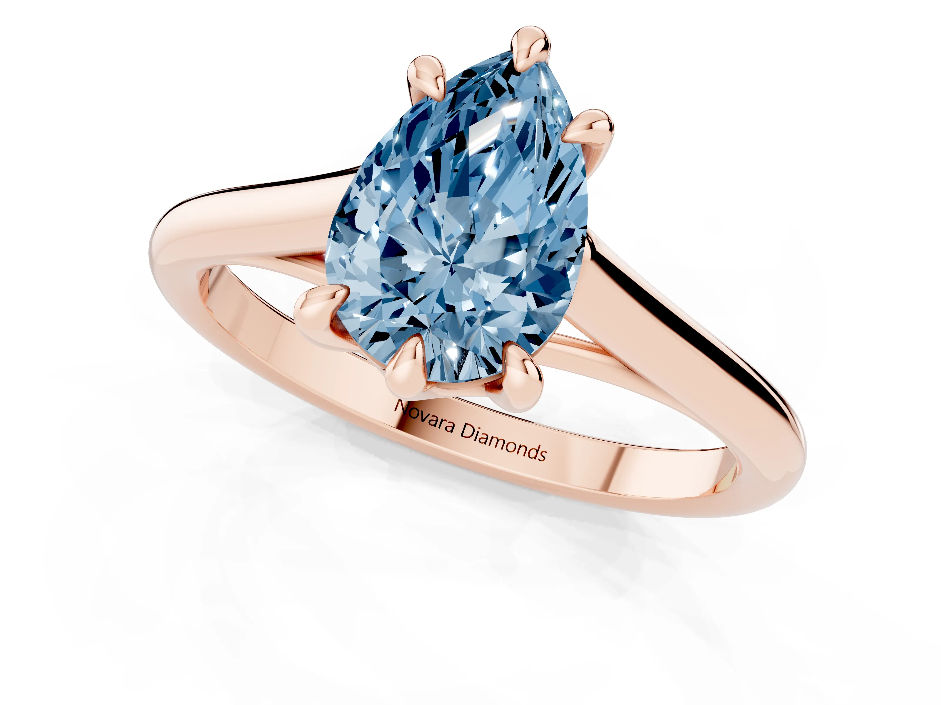 Fancy Blue Pear Cut Diamond Solitaire Engagement Ring Set in Rose gold with Prong Setting and Plain Classic Band