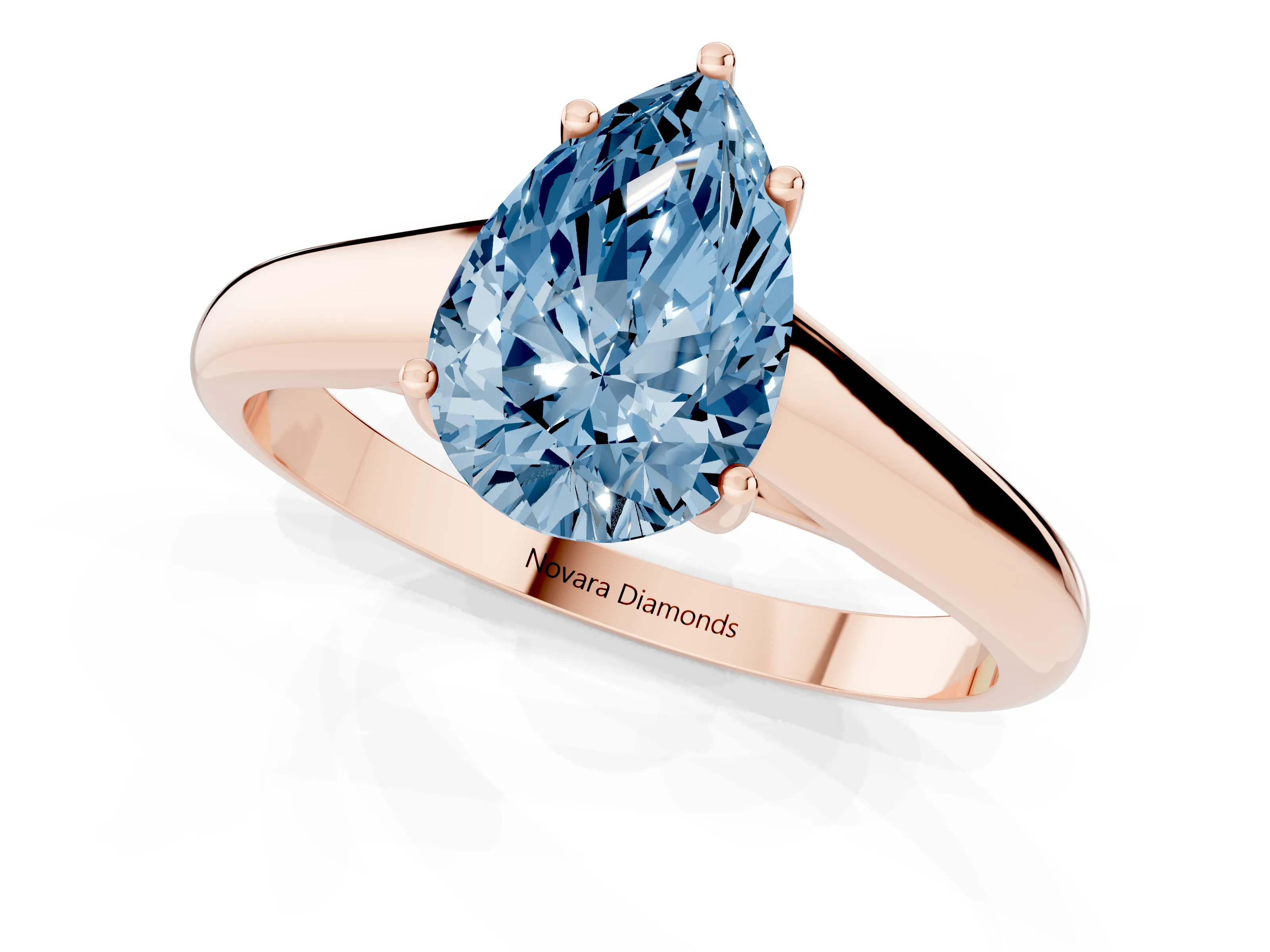 Fancy Blue Pear Cut Diamond Solitaire Engagement Ring Set in Rose gold with Subtly Tapered Band and Prong Setting