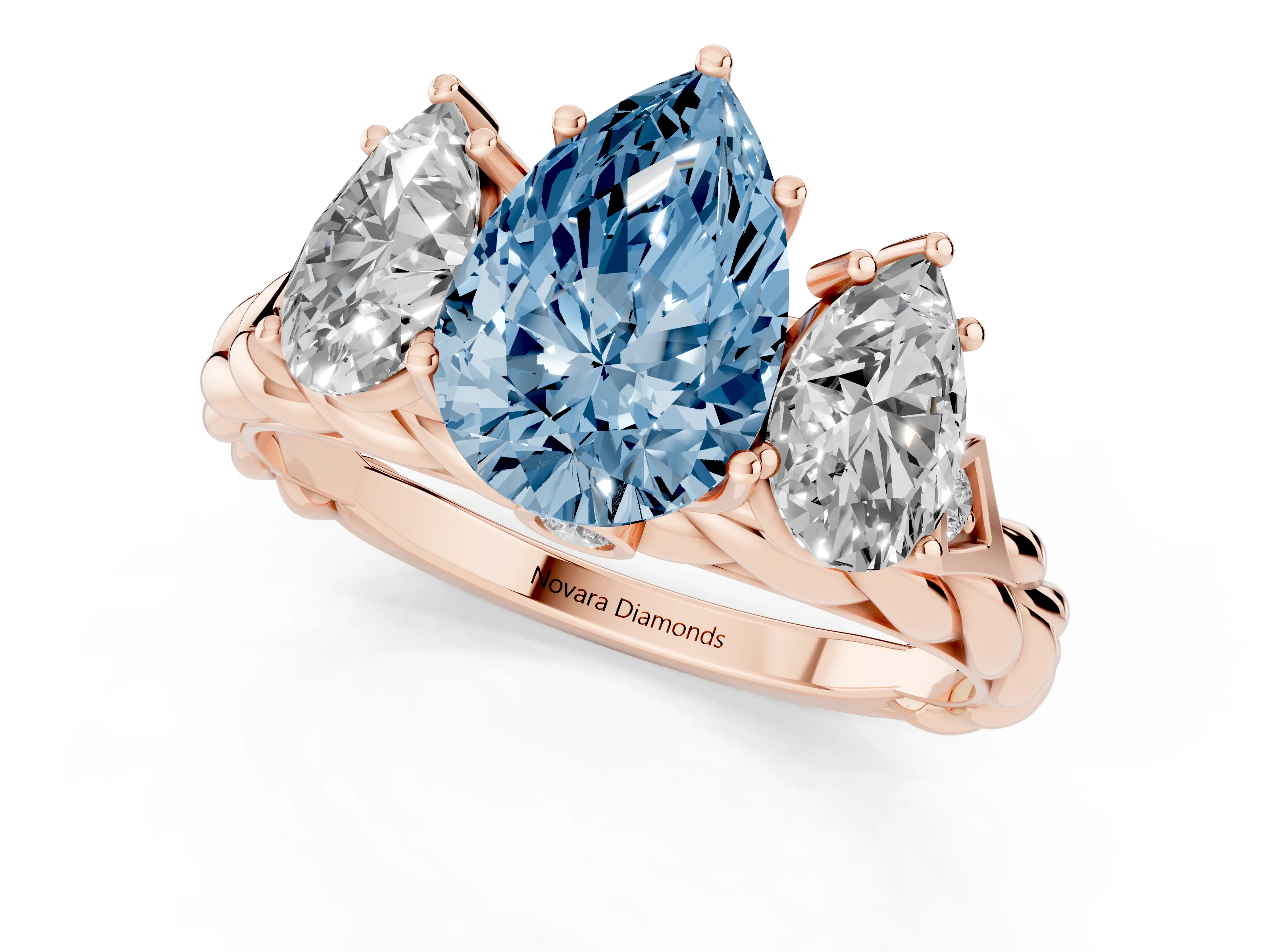 Fancy Blue Pear Cut Diamond Three-Stone Ring Set in Rose gold with Braided Band
