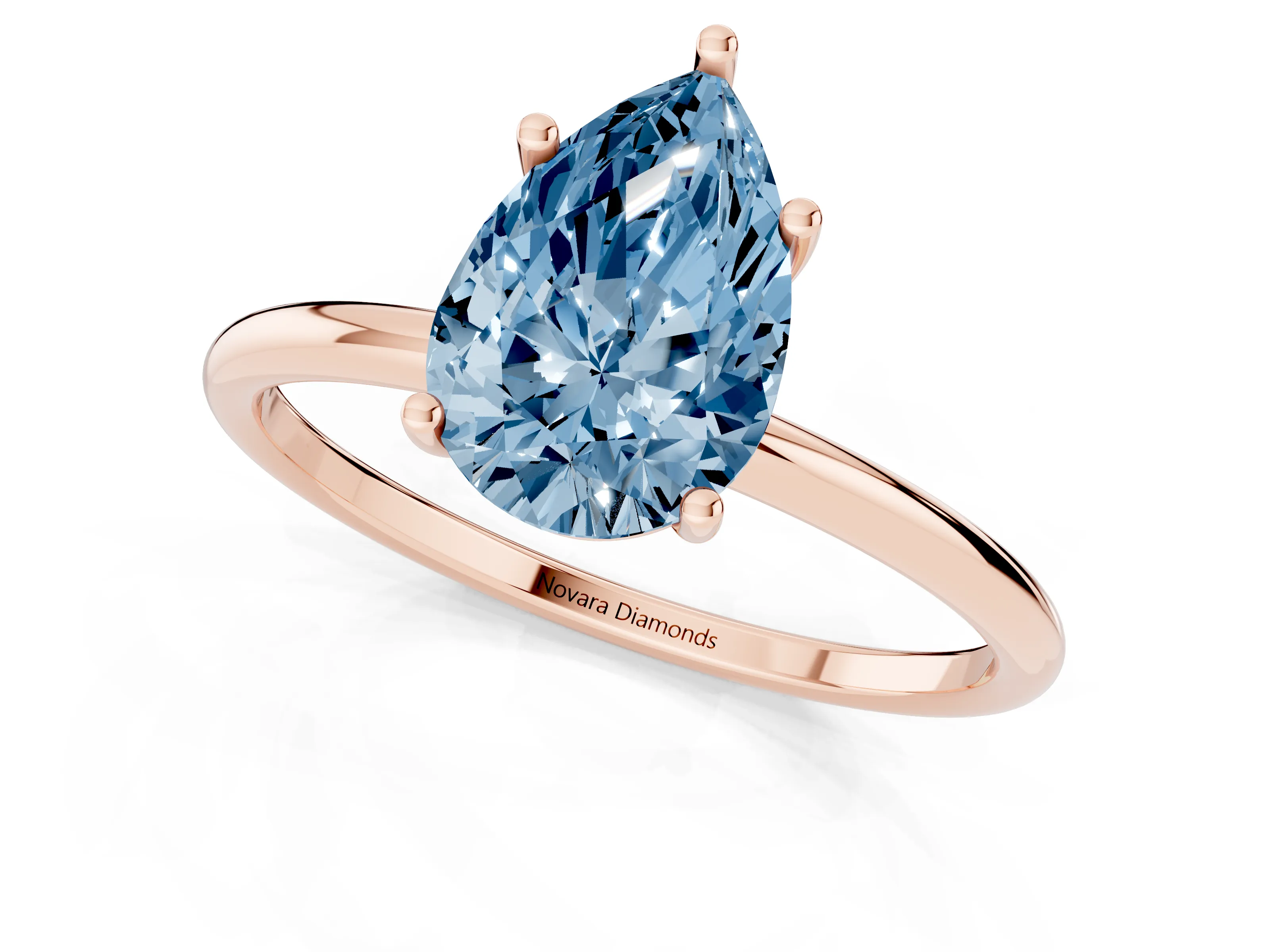 Fancy Blue Pear Cut Diamond Solitaire Engagement Ring Set in Rose gold with Thin Band and Prong Setting