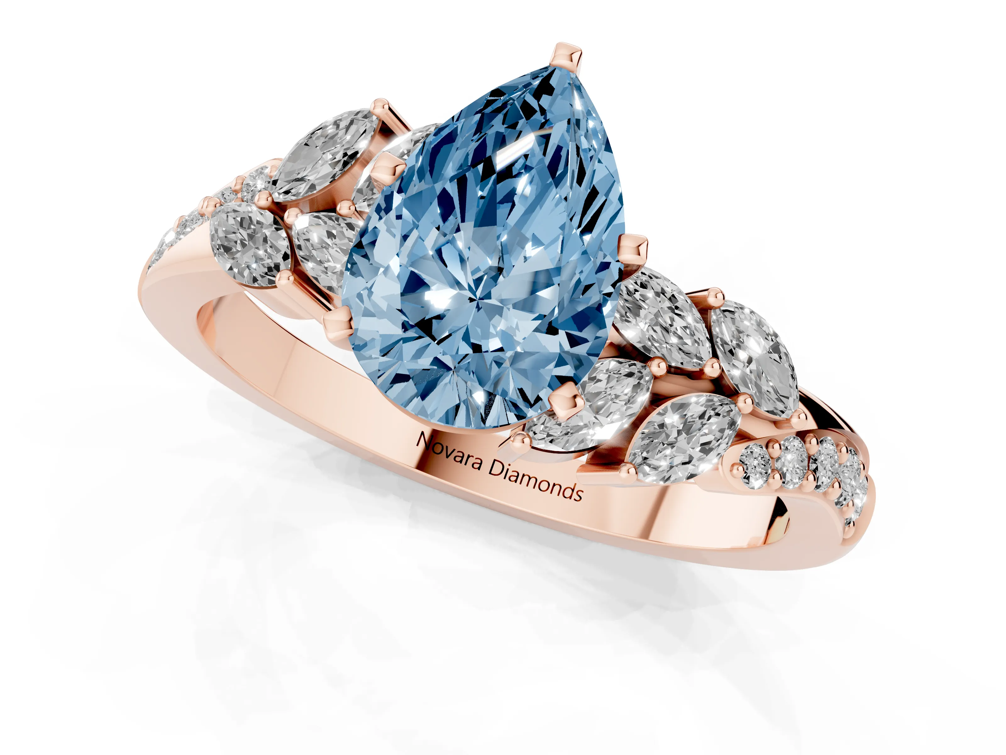 Fancy Blue Pear Cut Diamond Solitaire Ring Set in Rose gold with Marquise Twist Band and Prong Setting
