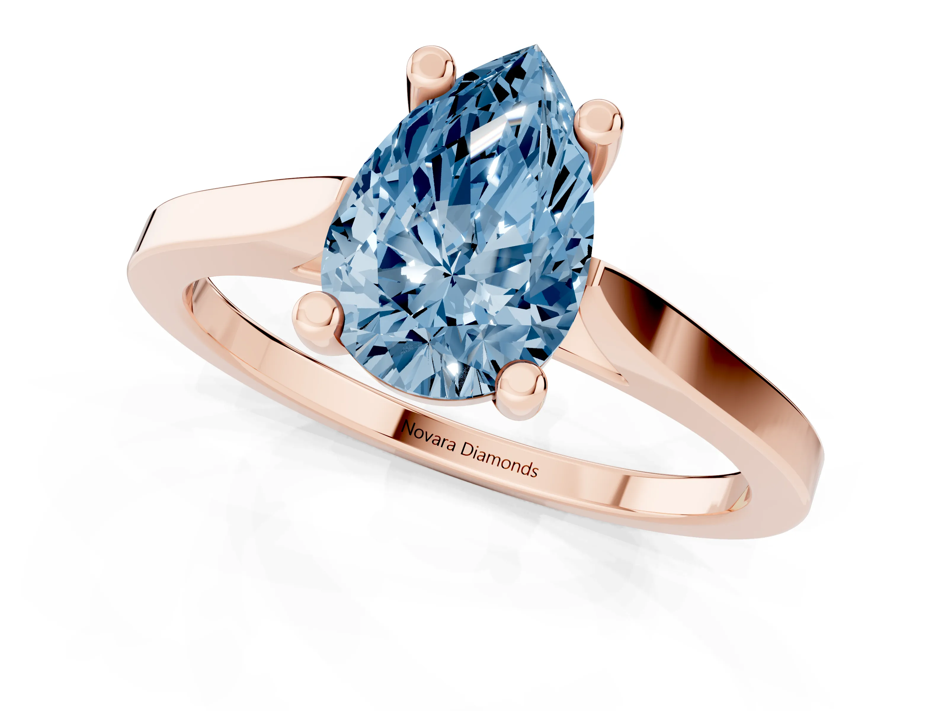 Fancy Blue Pear Cut Diamond Solitaire Ring Set in Rose gold with Prong Setting and Tapered Band