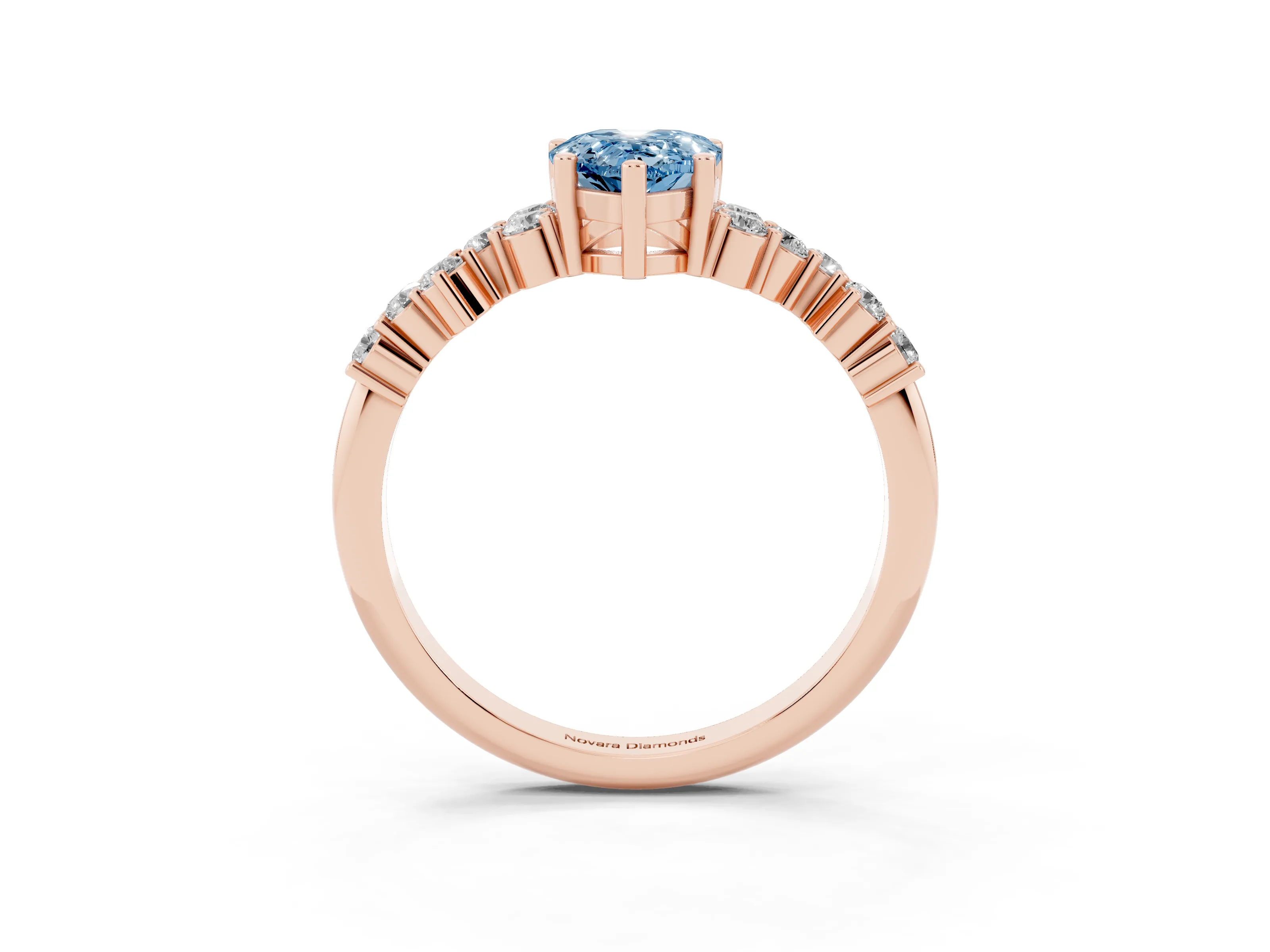 Fancy Blue Pear Cut Diamond Ring Set in Rose gold with Scattered Round Accents