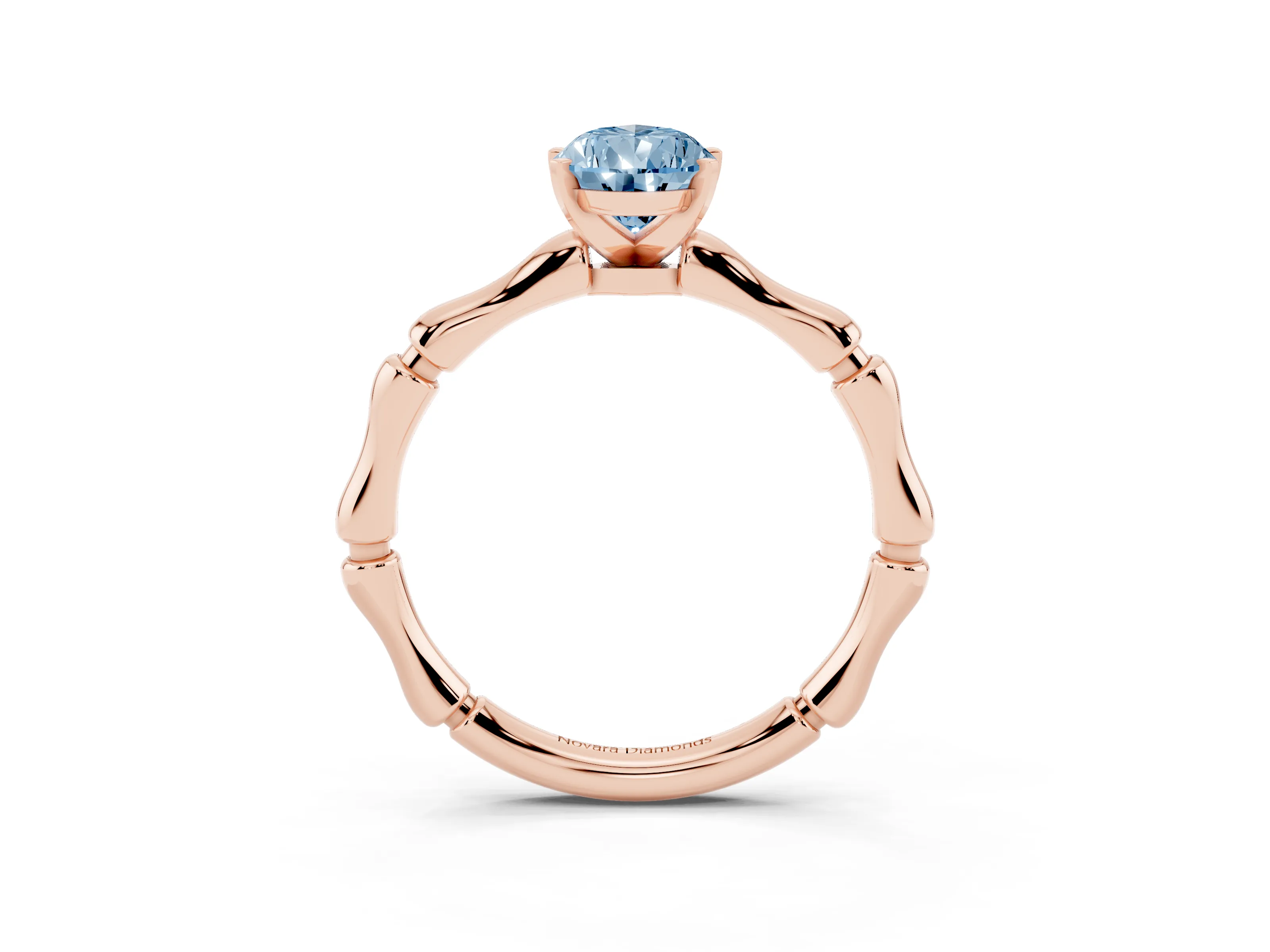 Fancy Blue Pear Cut Diamond Solitaire Ring Set in Rose gold with Bamboo Band and Prong Setting