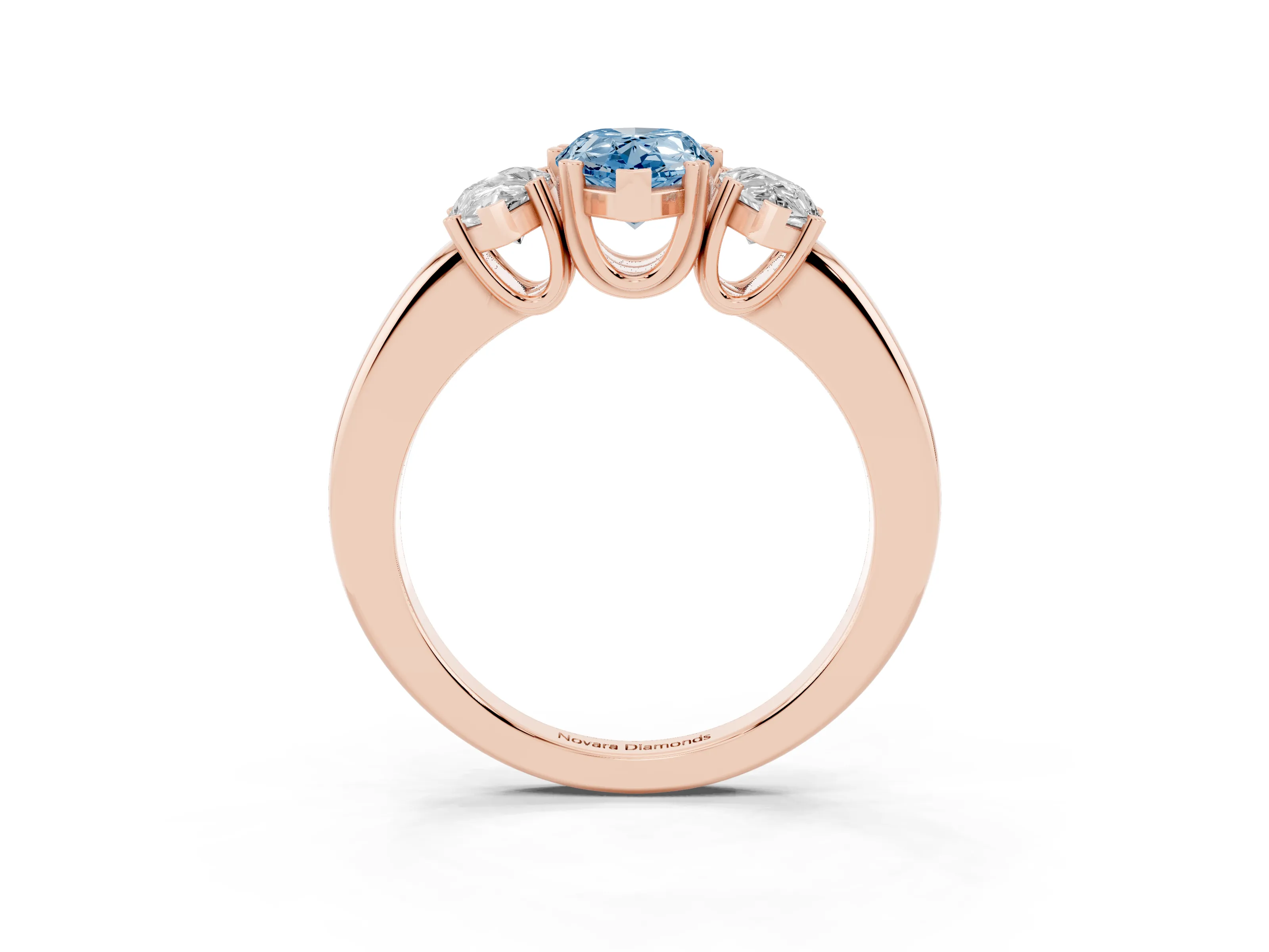 Fancy Blue Pear Cut Diamond Three-Stone Ring Set in Rose gold with Polished Channel-Set Band