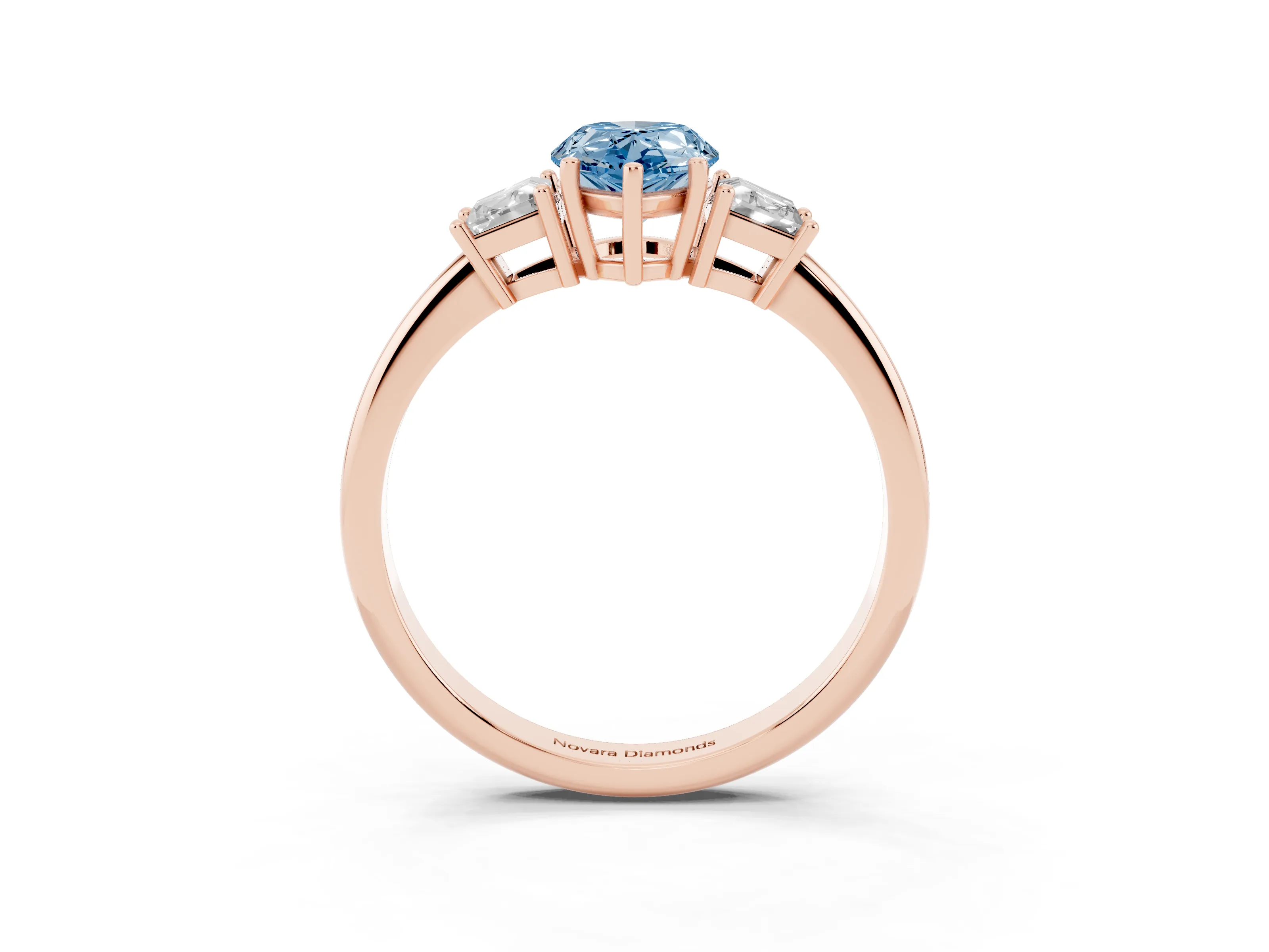 Fancy Blue Pear Cut Diamond Three-Stone Ring Set in Rose gold with Trapezoid Side Stones and Prong Setting