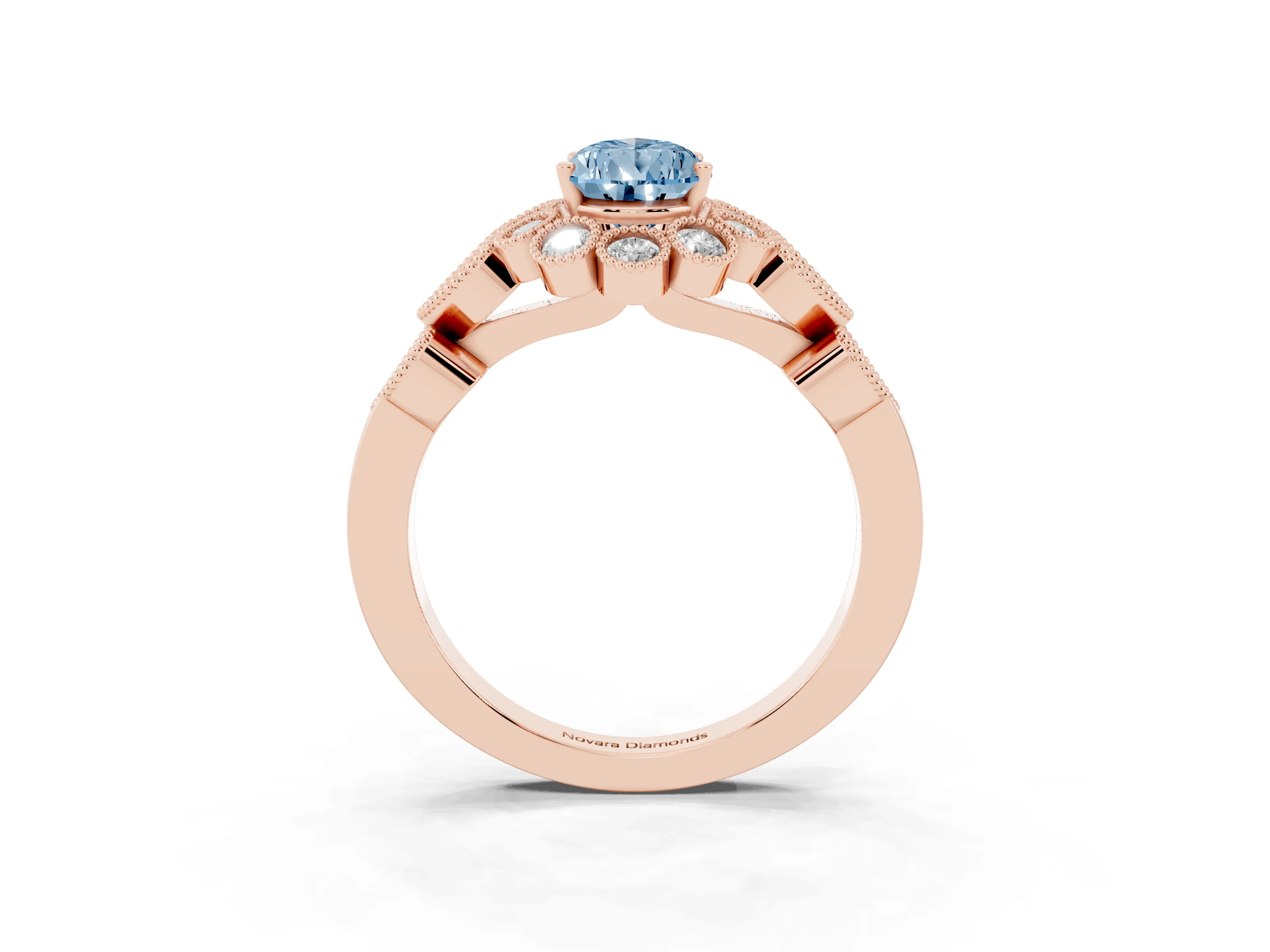 Fancy Blue Pear Cut Diamond Solitaire Ring Set in Rose gold with Milgrain Pavé Heart Band