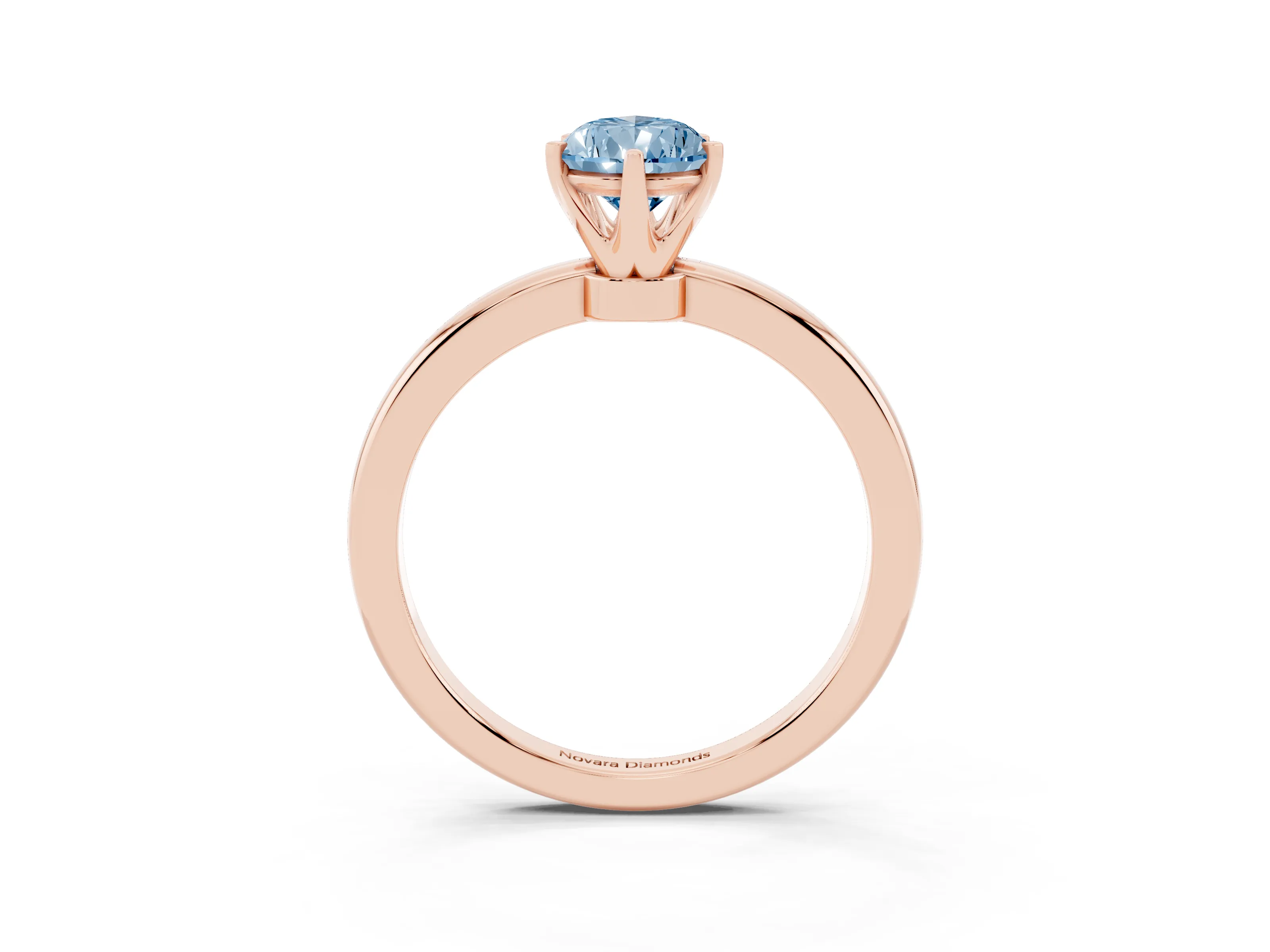 Fancy Blue Pear Cut Diamond Solitaire Ring Set in Rose gold with Raised Prong Setting on a Classic Band