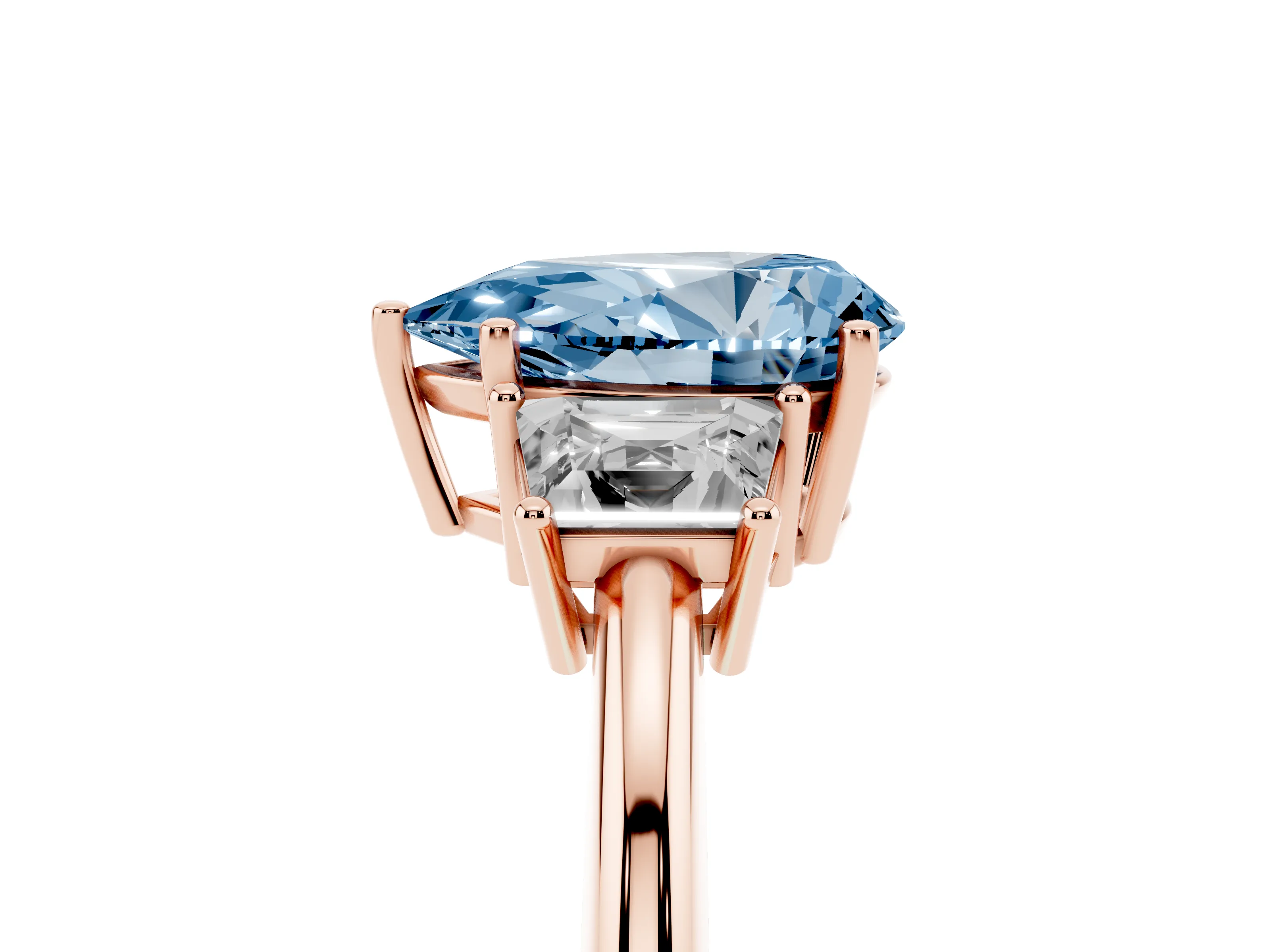 Fancy Blue Pear Cut Diamond Three-Stone Ring Set in Rose gold with Trapezoid Side Stones and Prong Setting