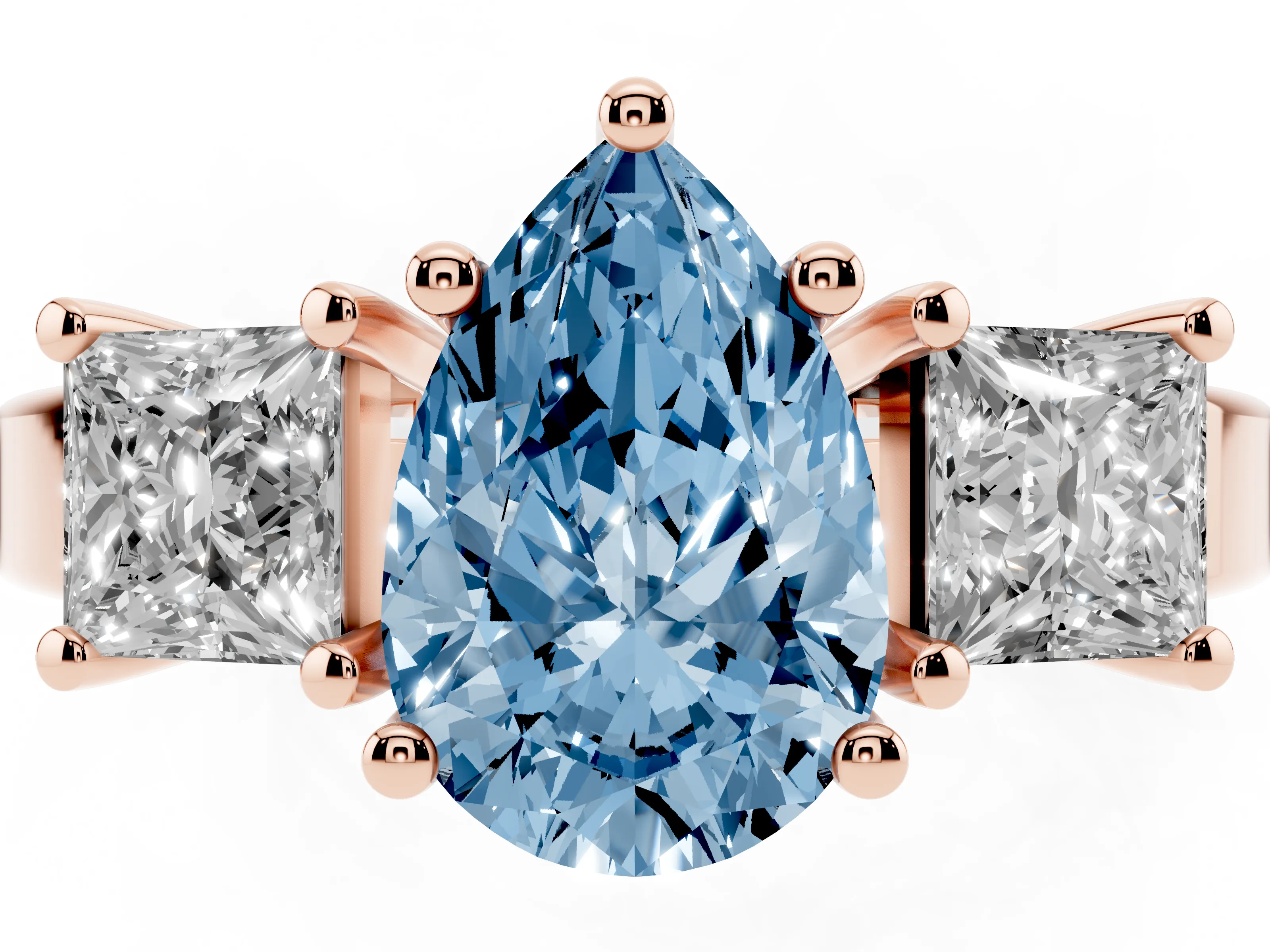 Fancy Blue Three-Stone Pear Cut Diamond Solitaire Ring Set in Rose gold with Prong Setting