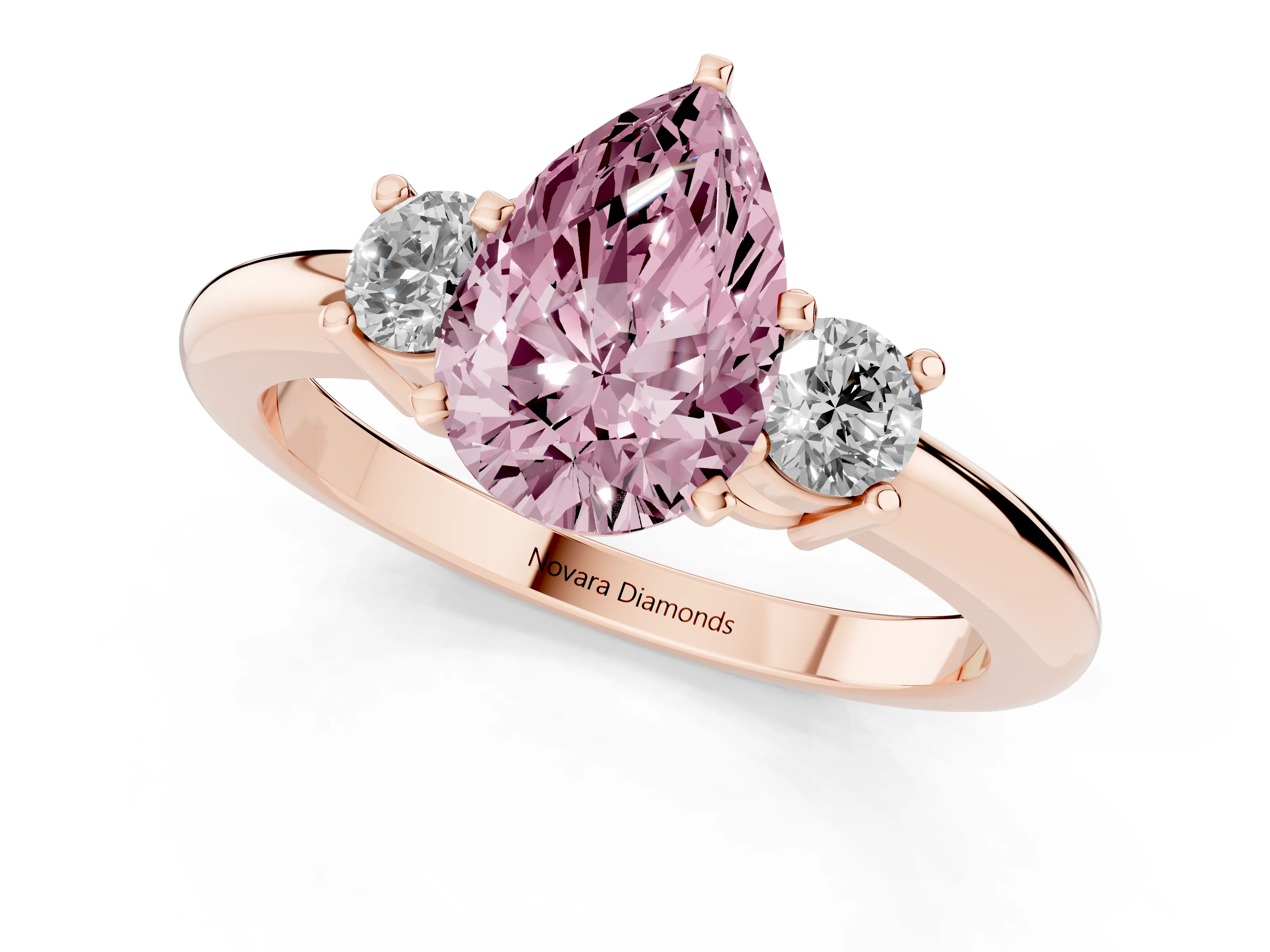 Fancy Pink Three-Stone Pear Cut Diamond Ring Set in Rose gold with Prong Setting and Plain Band