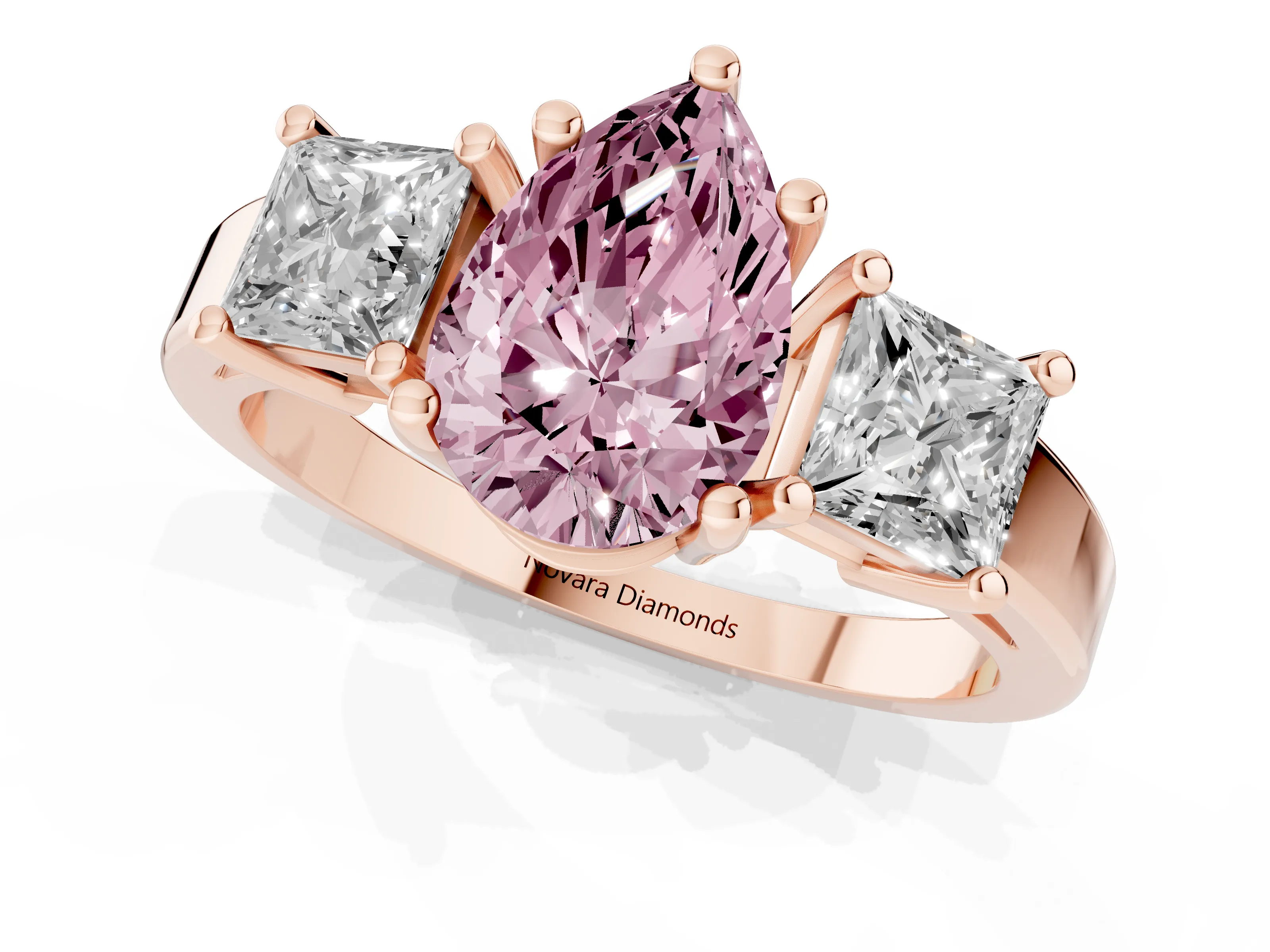 Fancy Pink Three-Stone Pear Cut Diamond Solitaire Ring Set in Rose gold with Prong Setting