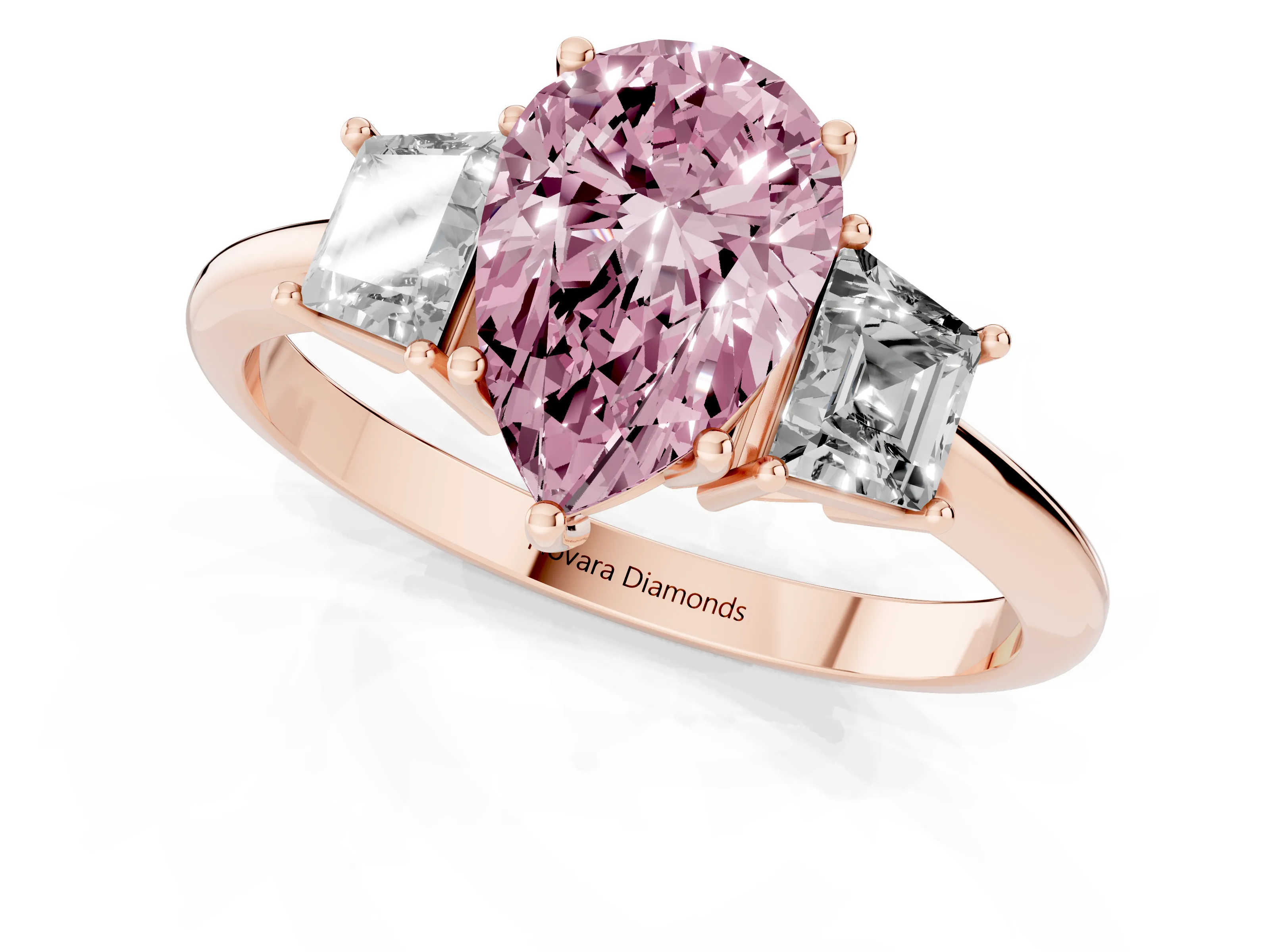 Fancy Pink Pear Cut Diamond Three-Stone Ring Set in Rose gold with Trapezoid Side Stones and Prong Setting