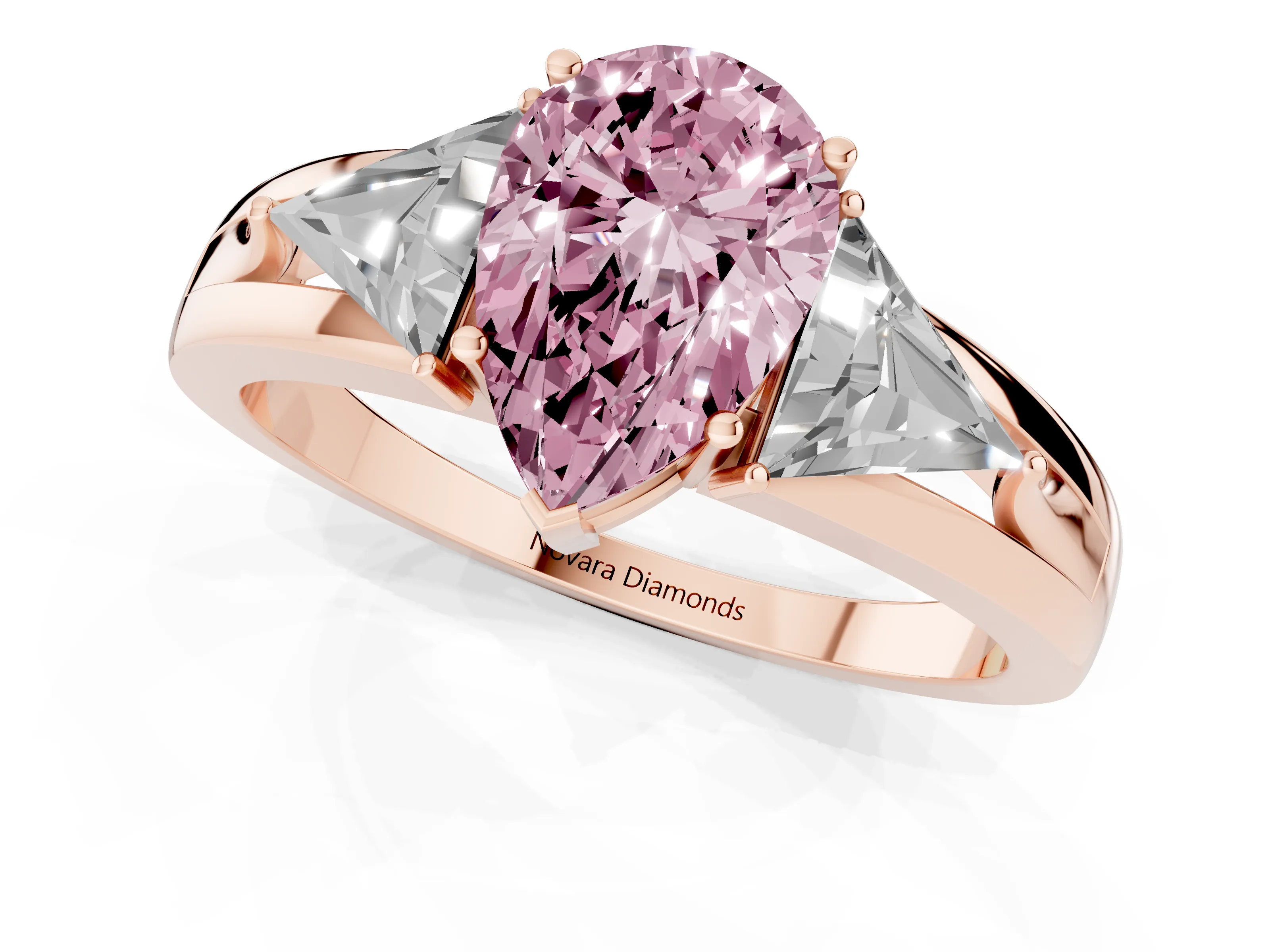 Fancy Pink Pear Cut Diamond Three-Stone Ring Set in Rose gold with Trillion Side Stones and Split Shank