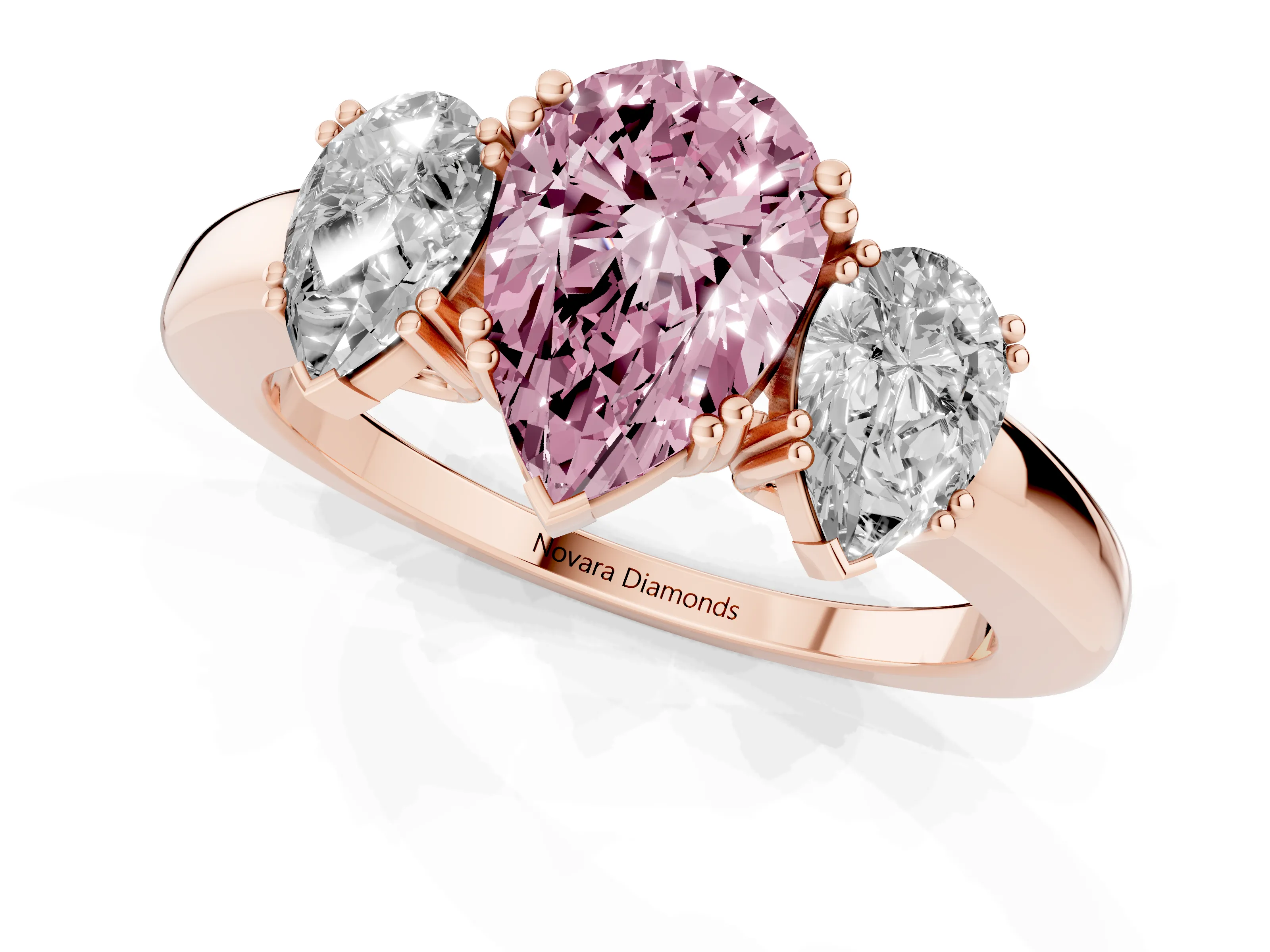 Fancy Pink Pear Cut Diamond Three-Stone Ring Set in Rose gold with Polished Channel-Set Band