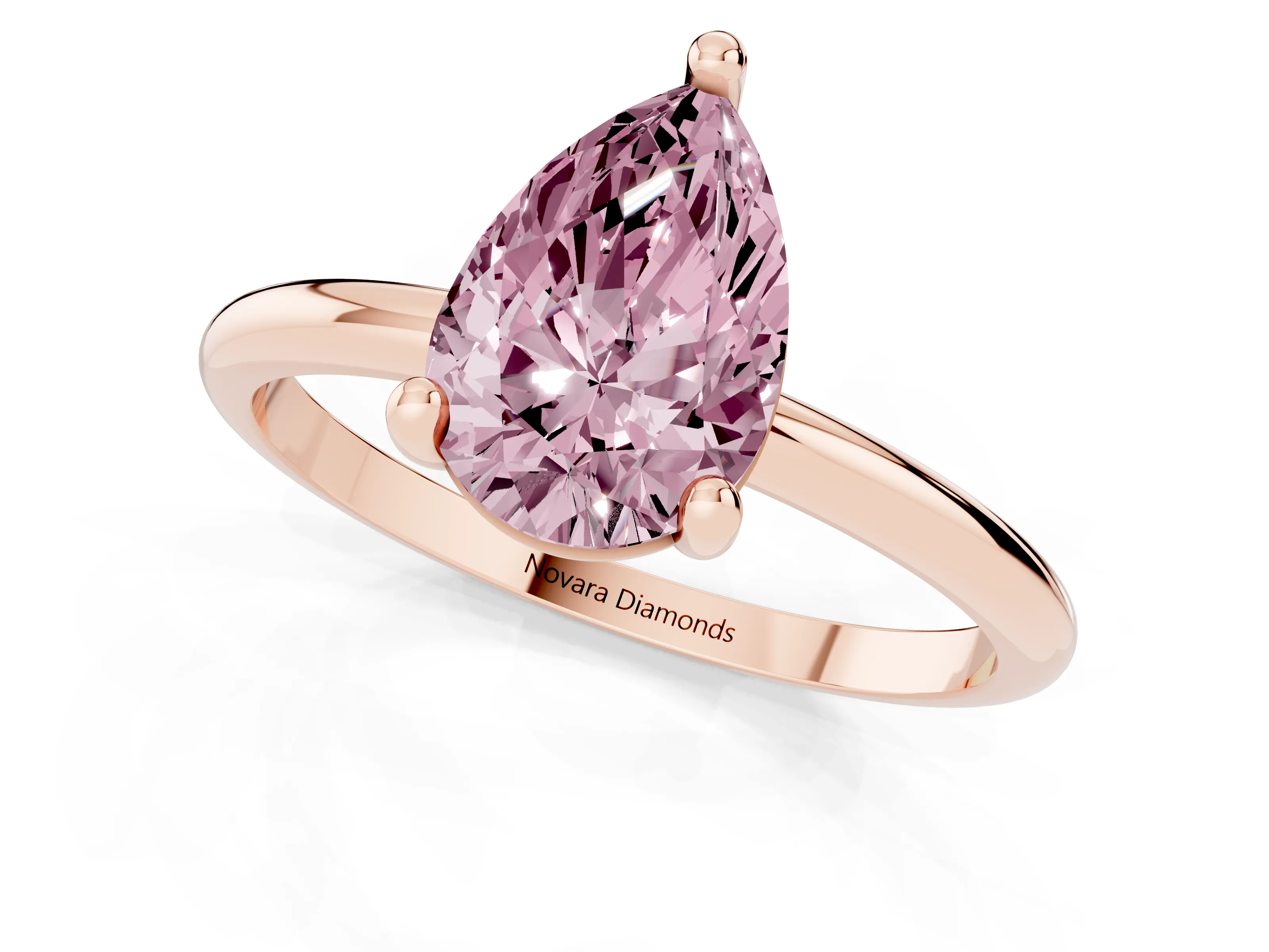 Fancy Pink Pear Cut Diamond Solitaire Ring Set in Rose gold with Secure Prong Setting on a Classic Band
