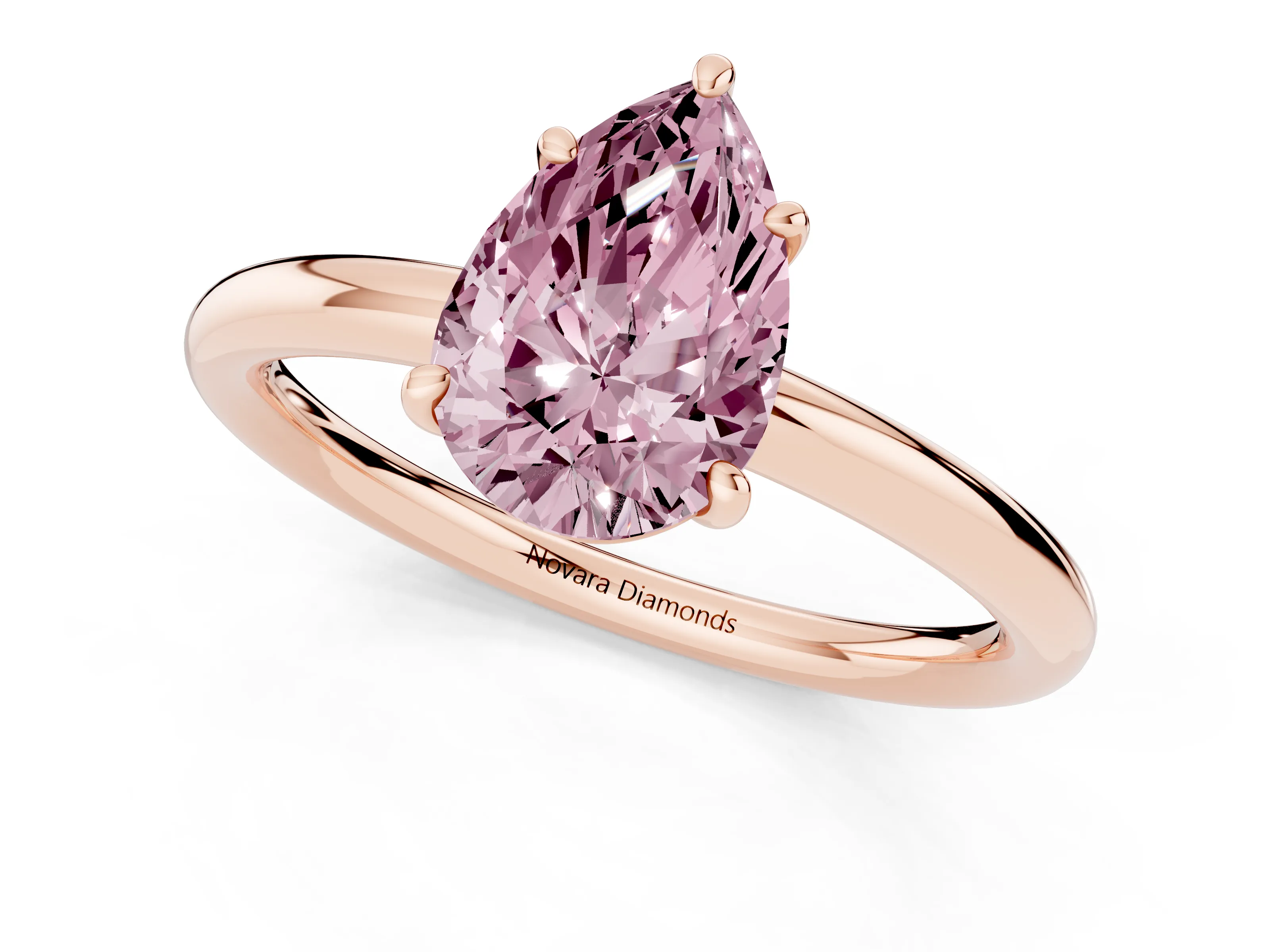 Fancy Pink Pear Cut Diamond Solitaire Ring Set in Rose gold with Prong Setting on a Polished Plain Band