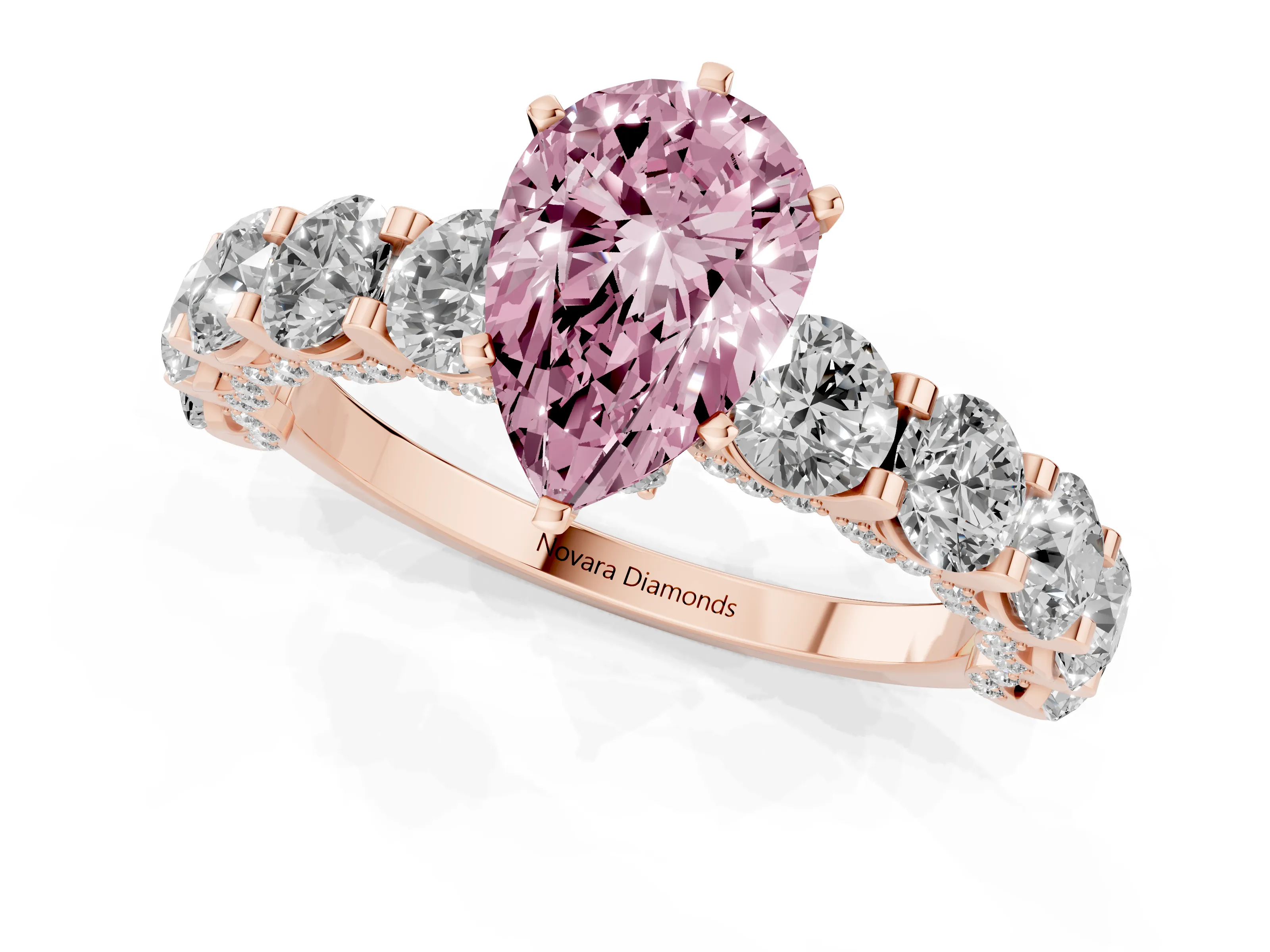 Fancy Pink Pear Cut Diamond Side Stone Ring Set in Rose gold with Alternating Round and Oval Side Stones