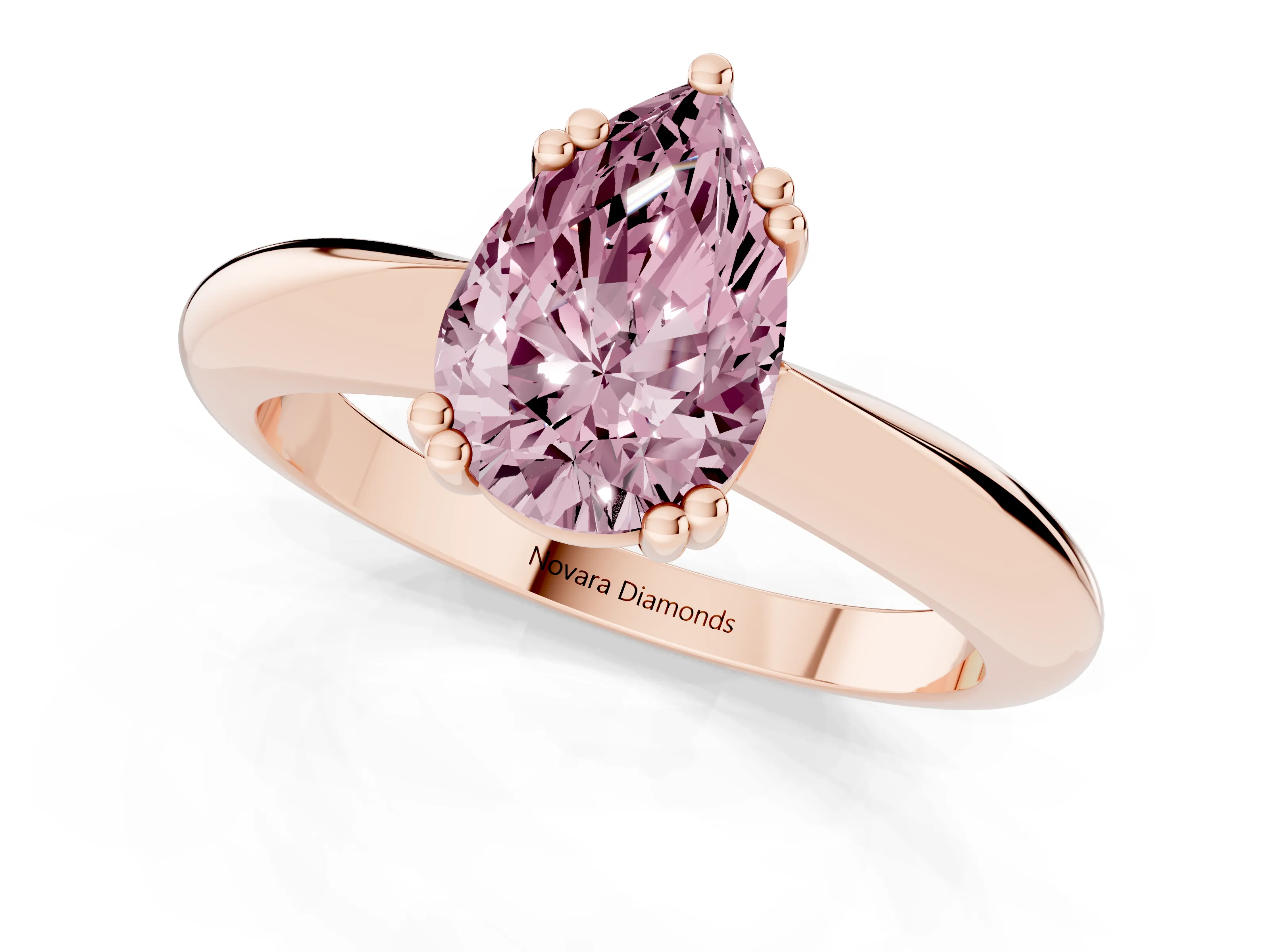 Fancy Pink Pear Cut Diamond Solitaire Engagement Ring Set in Rose gold with Tapered Band and Prong Setting