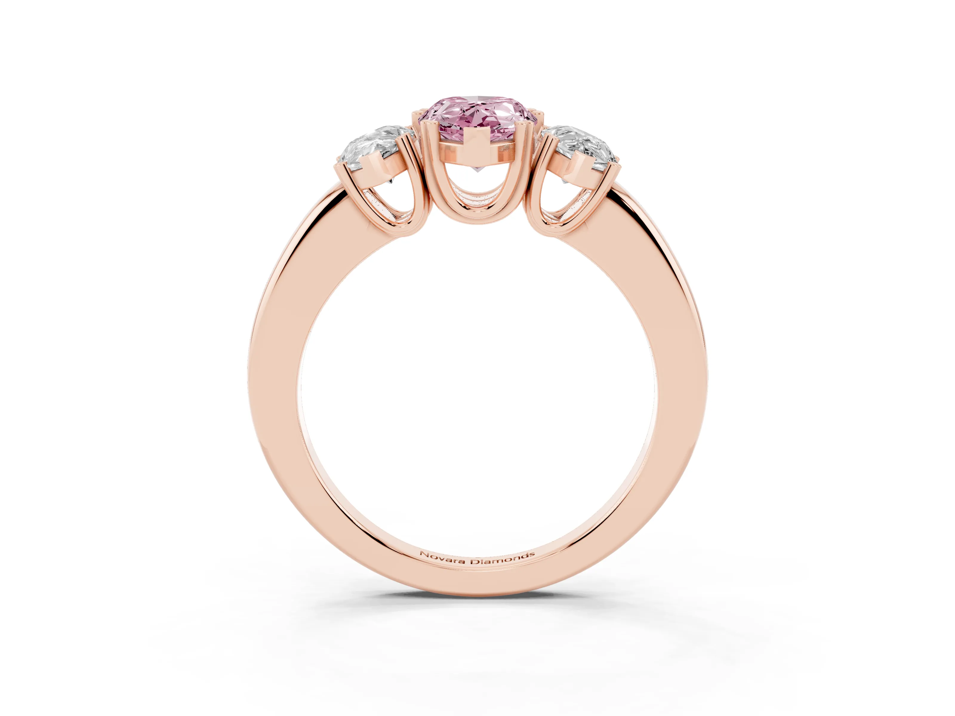 Fancy Pink Pear Cut Diamond Three-Stone Ring Set in Rose gold with Polished Channel-Set Band