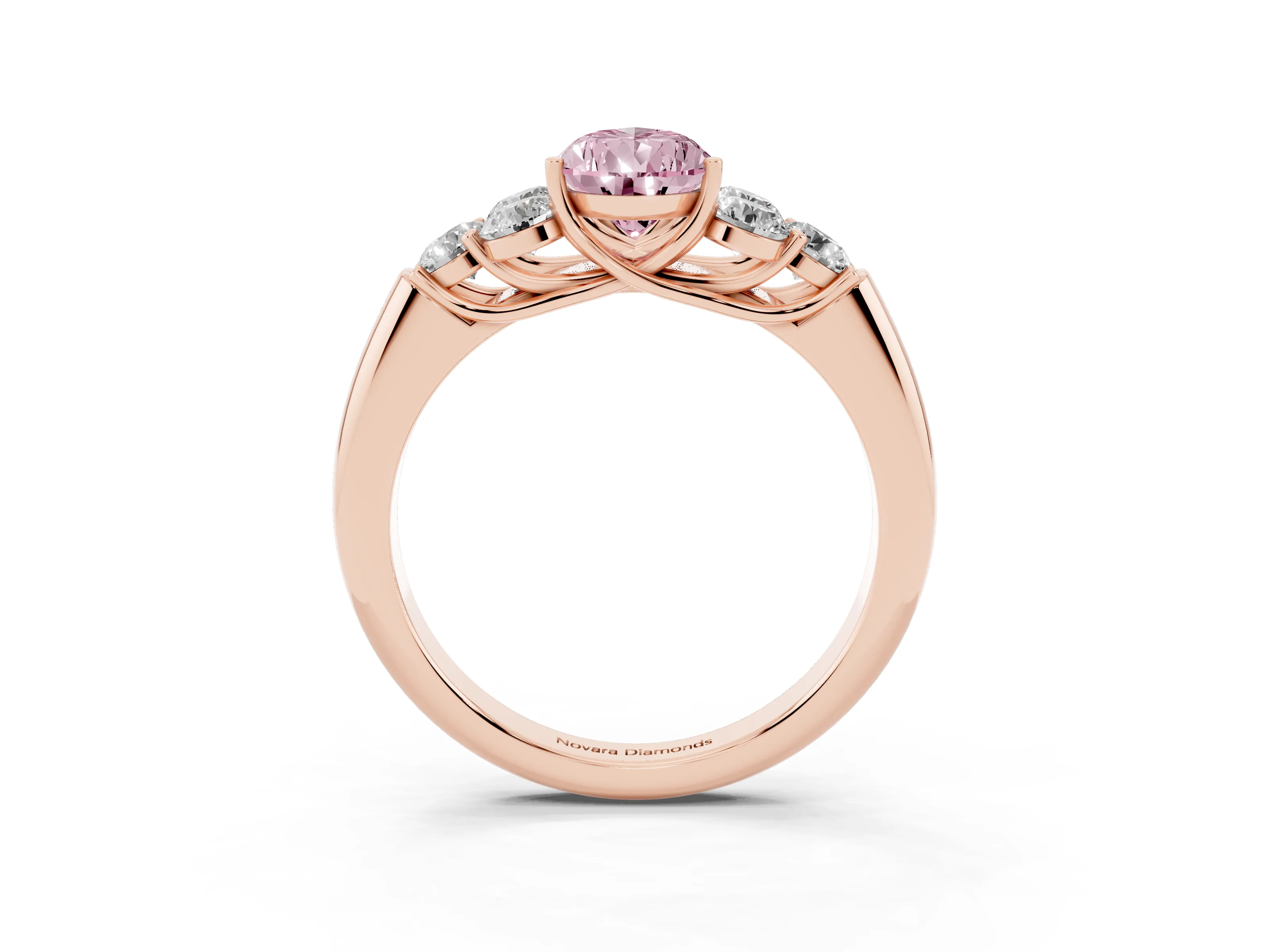 Fancy Pink Pear Cut Diamond Cluster Ring Set in Rose gold with Round Accent Stones and Prong Setting on a Plain Band