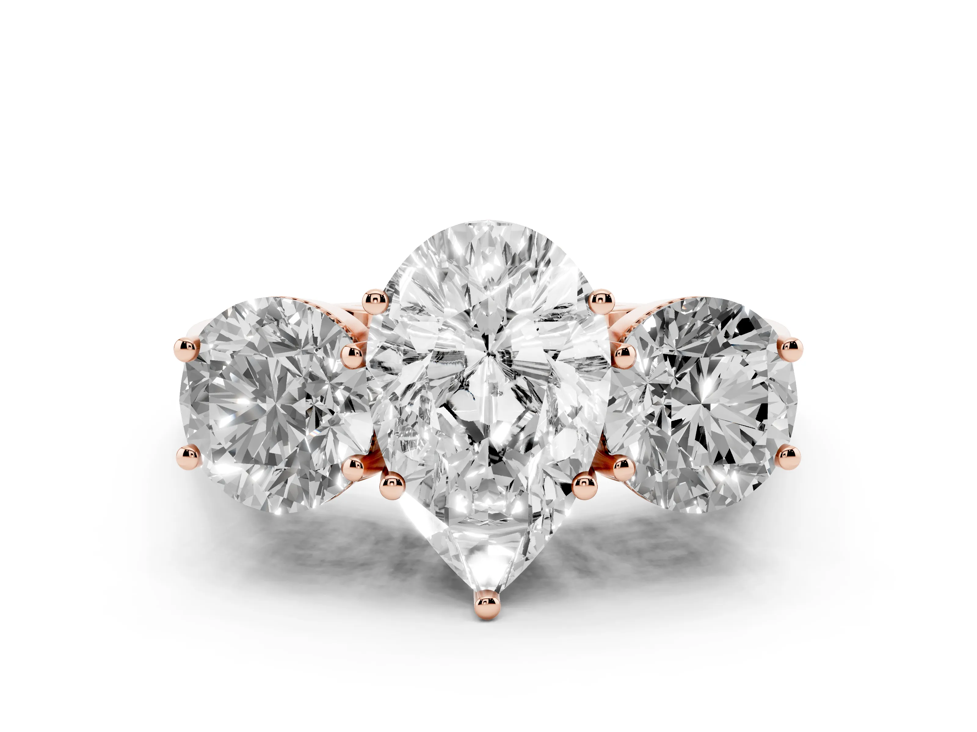 Pear Cut Diamond Three-Stone Engagement Ring Set in Rose gold with Polished Band