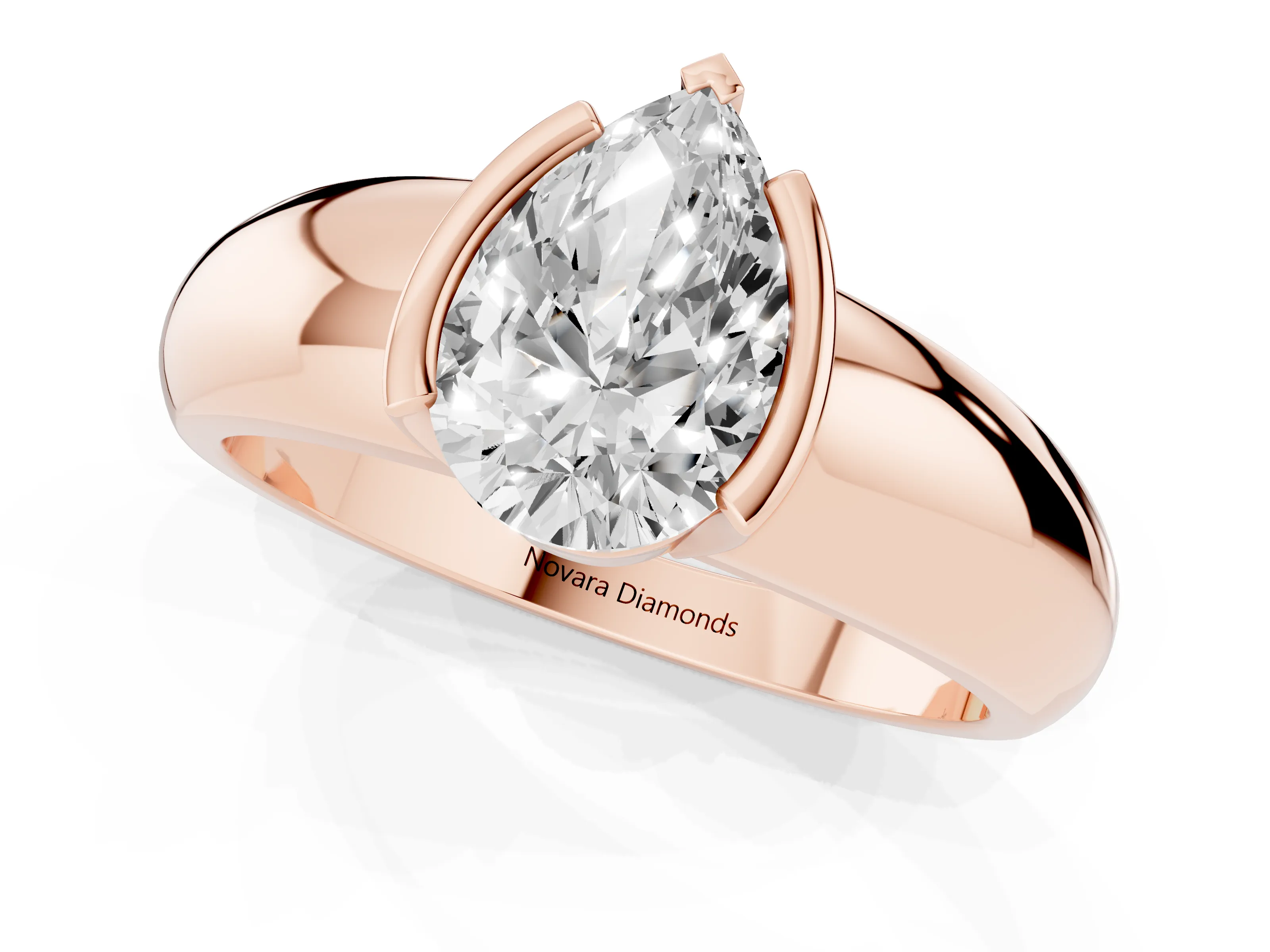 Pear Cut Diamond Solitaire Tension Set Ring Set in Rose gold with Wide Band