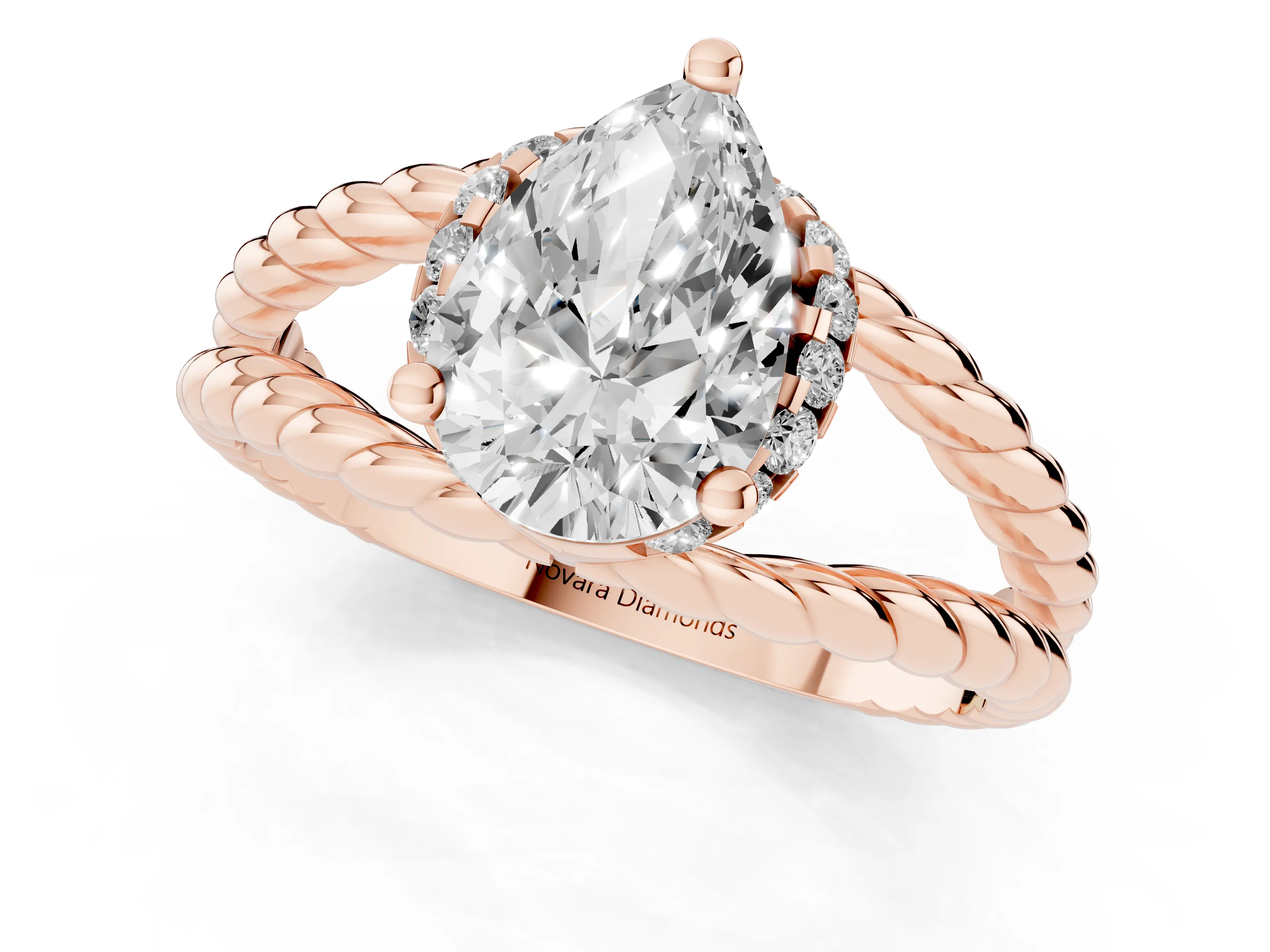 Pear Cut Diamond Halo Ring Set in Rose gold with Twisted Band and Prong Setting